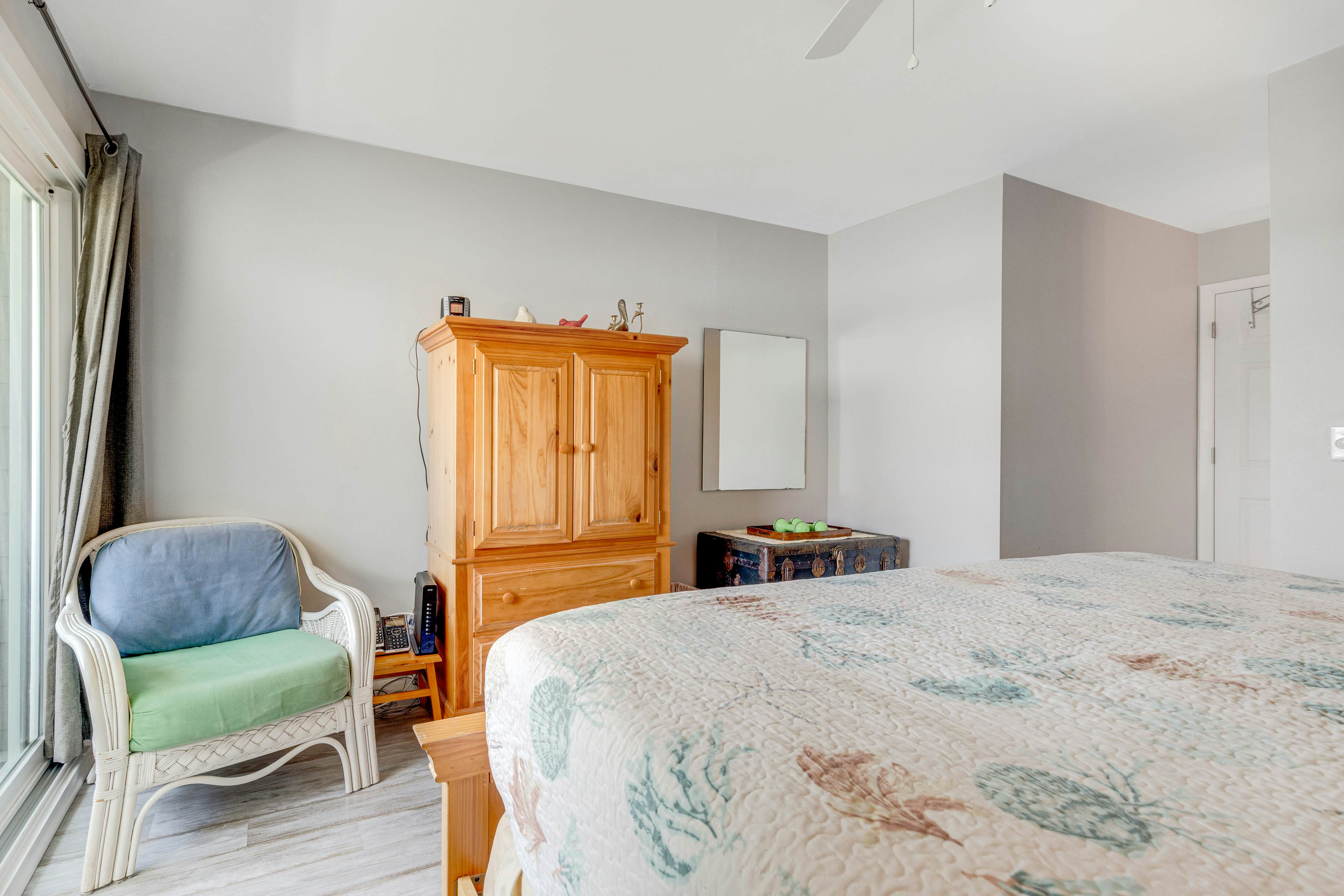 Second-floor villa w/ river views & community pool, tennis courts, and dock