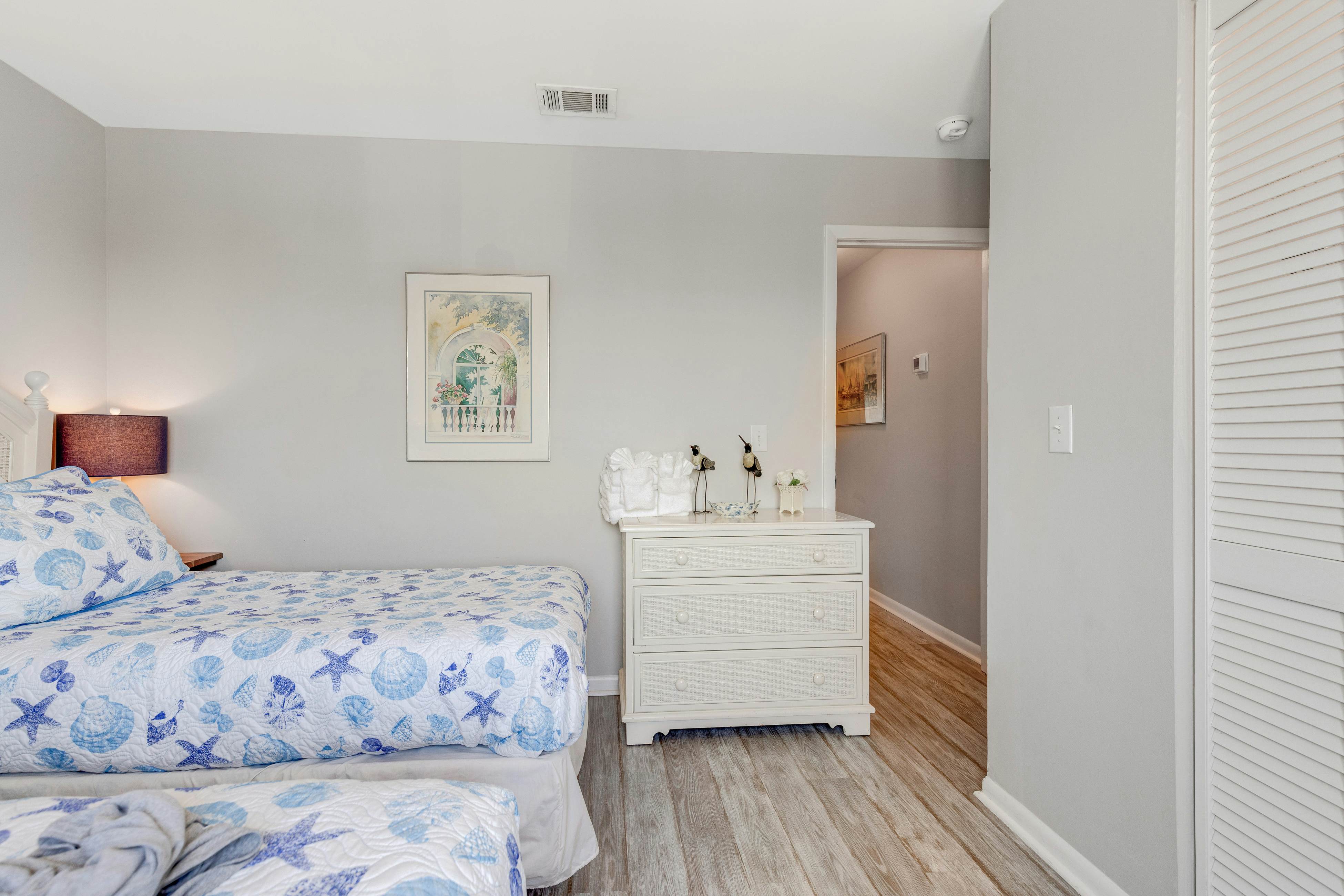 Second-floor villa w/ river views & community pool, tennis courts, and dock