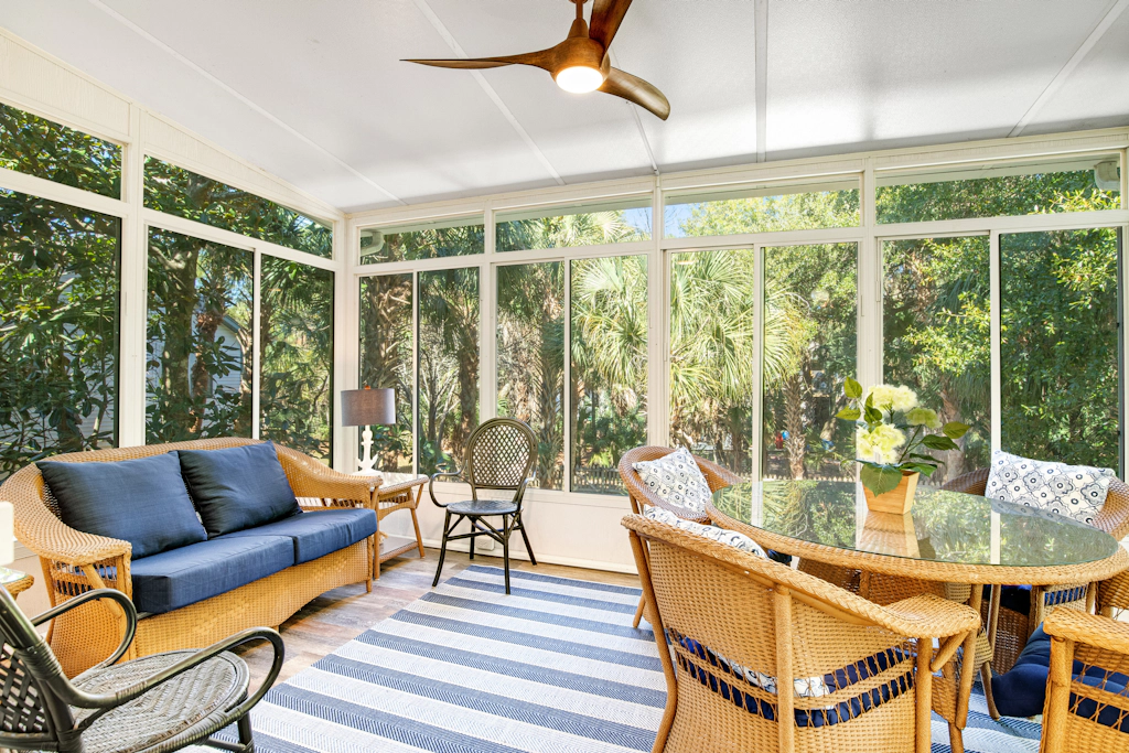 Palmetto-lined home with porches, yard & hammock - walk to beach/town