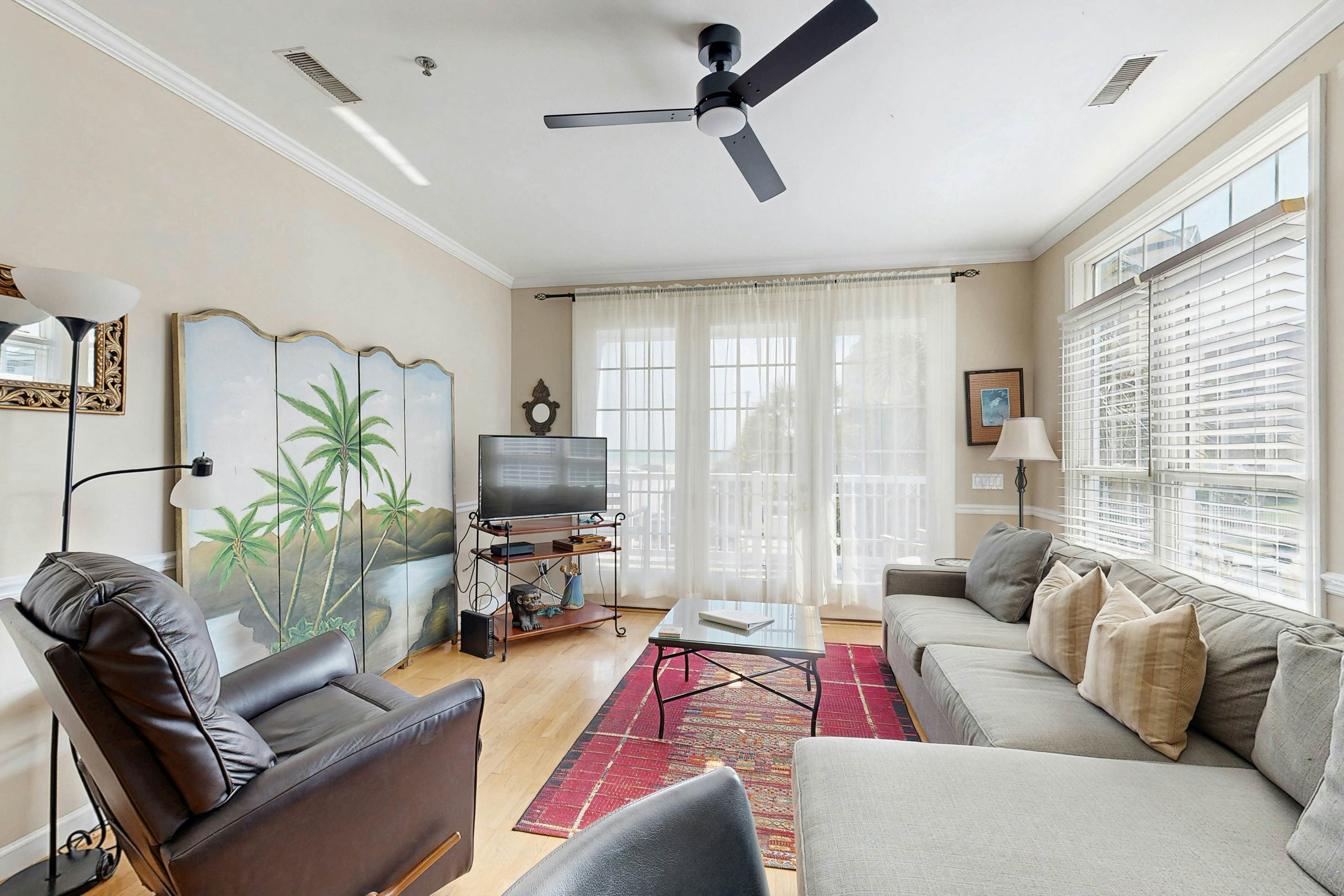 Oceanfront, first-level villa steps from the beach with a balcony & shared pool