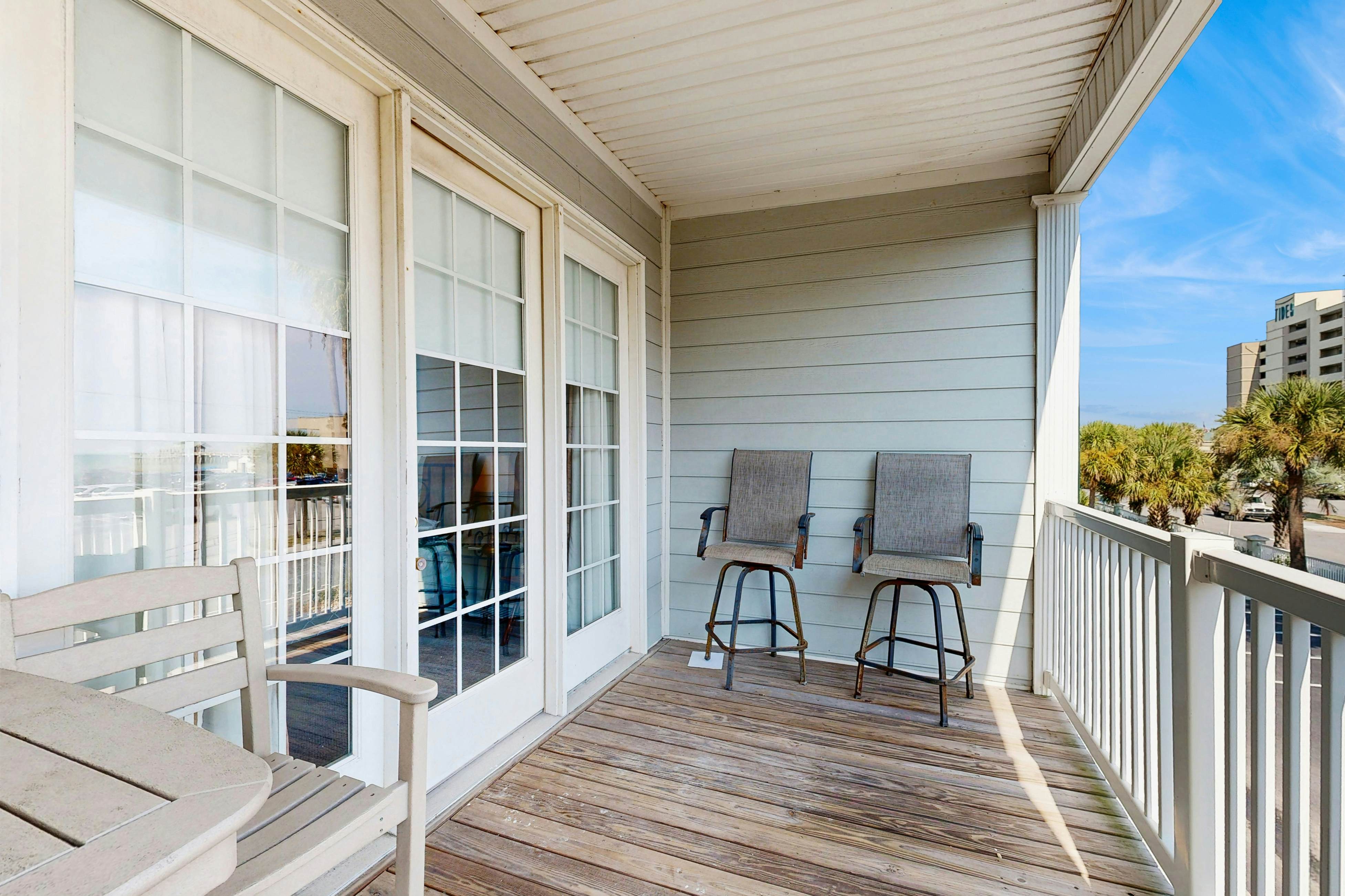 Oceanfront, first-level villa steps from the beach with a balcony & shared pool