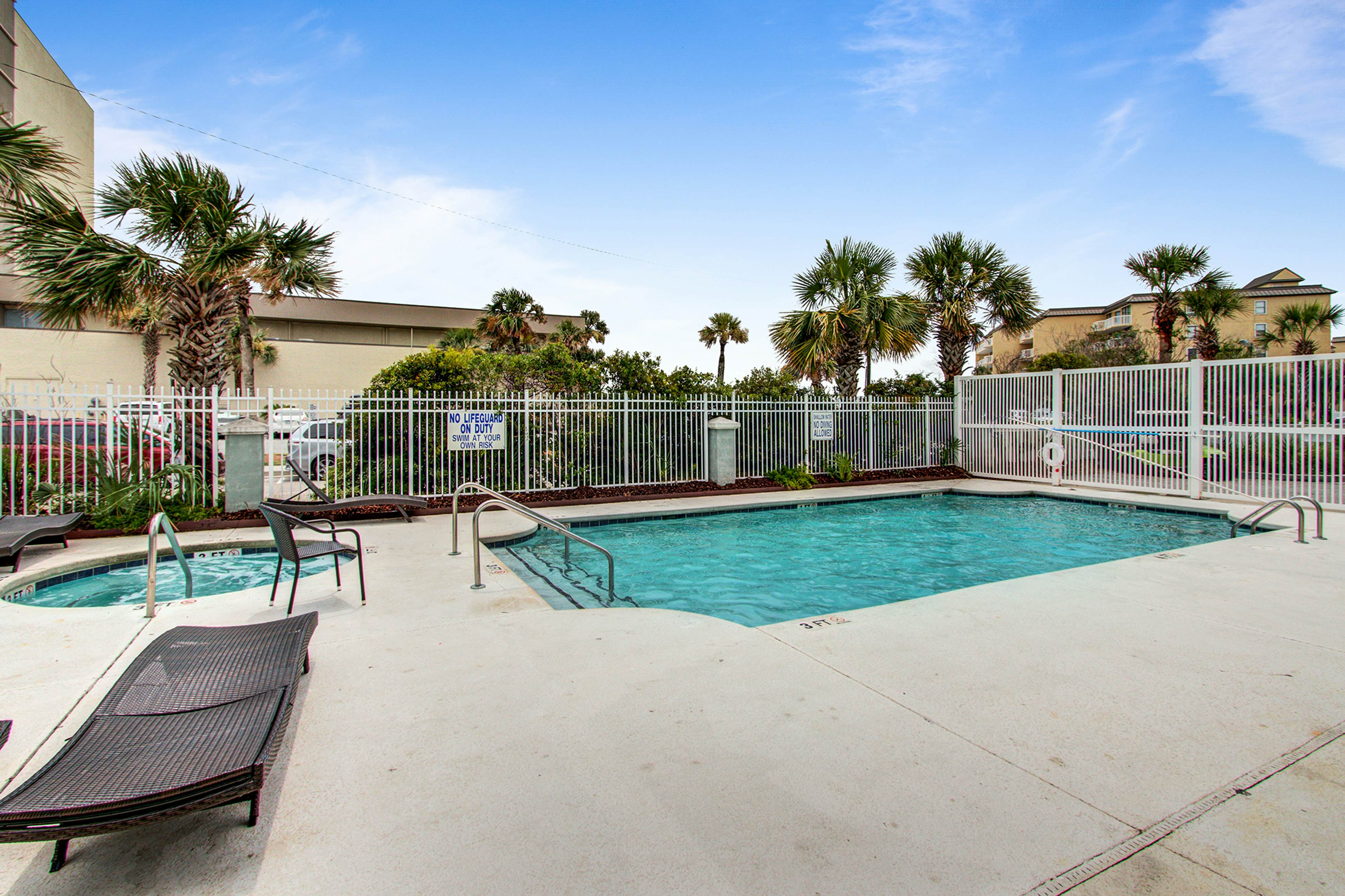 Oceanfront, first-level villa steps from the beach with a balcony & shared pool