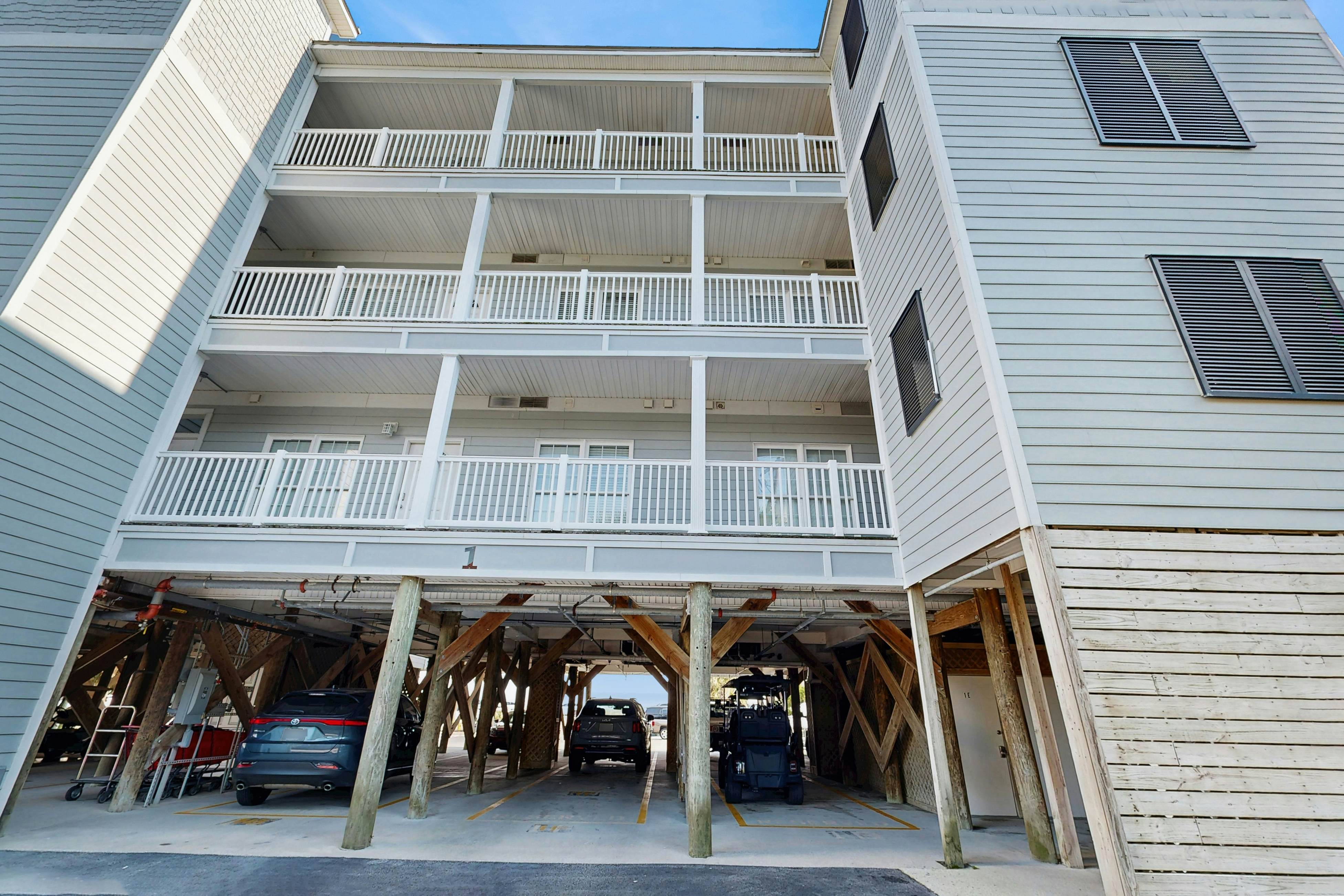 Oceanfront, first-level villa steps from the beach with a balcony & shared pool