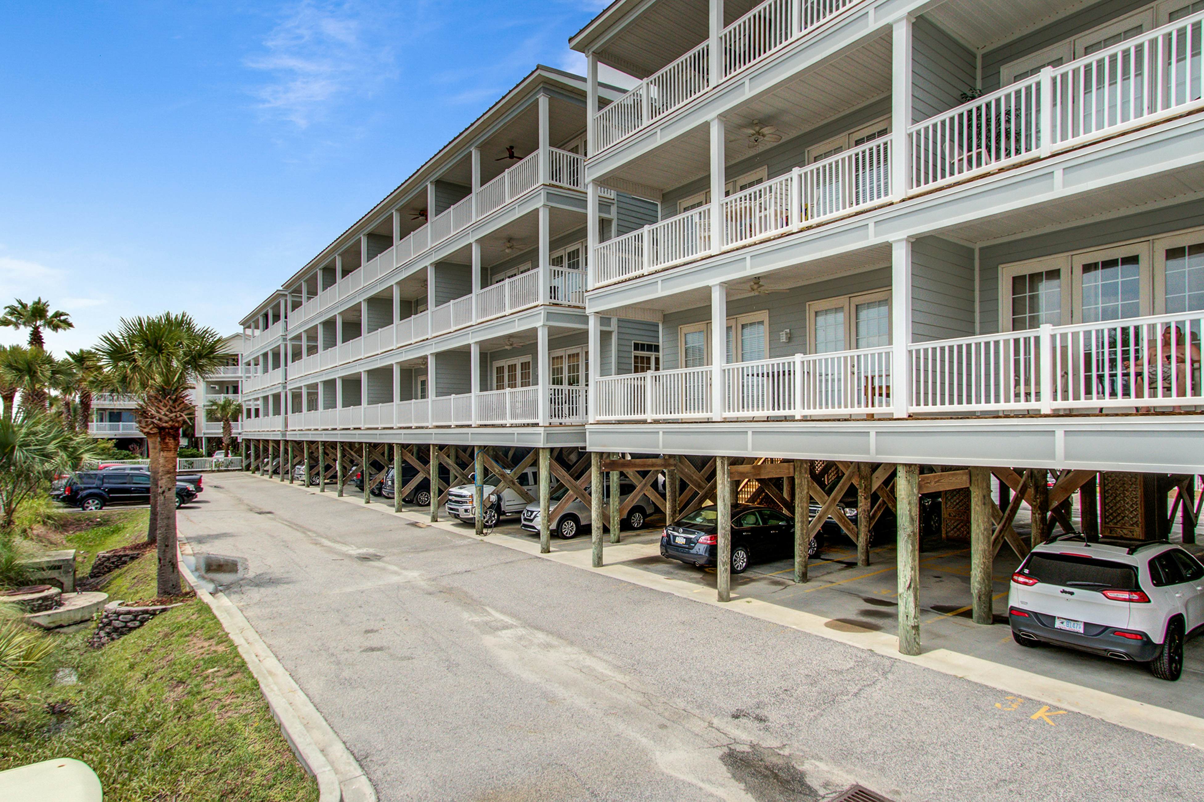 Oceanfront, first-level villa steps from the beach with a balcony & shared pool
