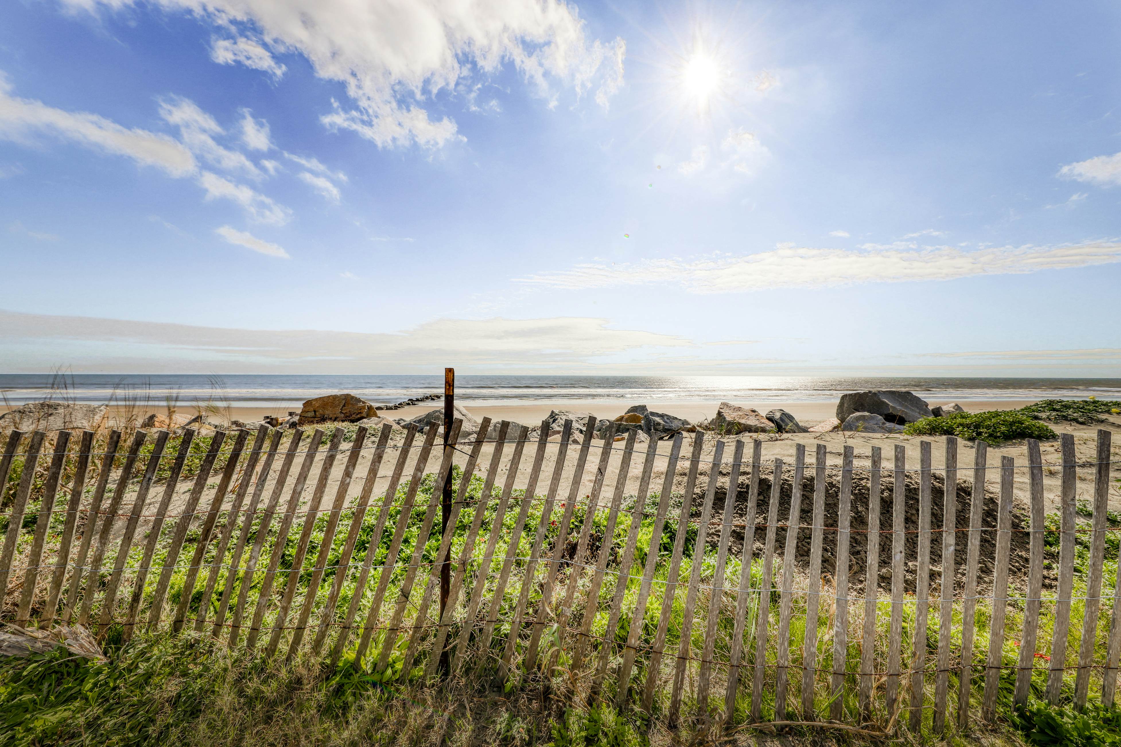 Oceanfront, first-level villa steps from the beach with a balcony & shared pool