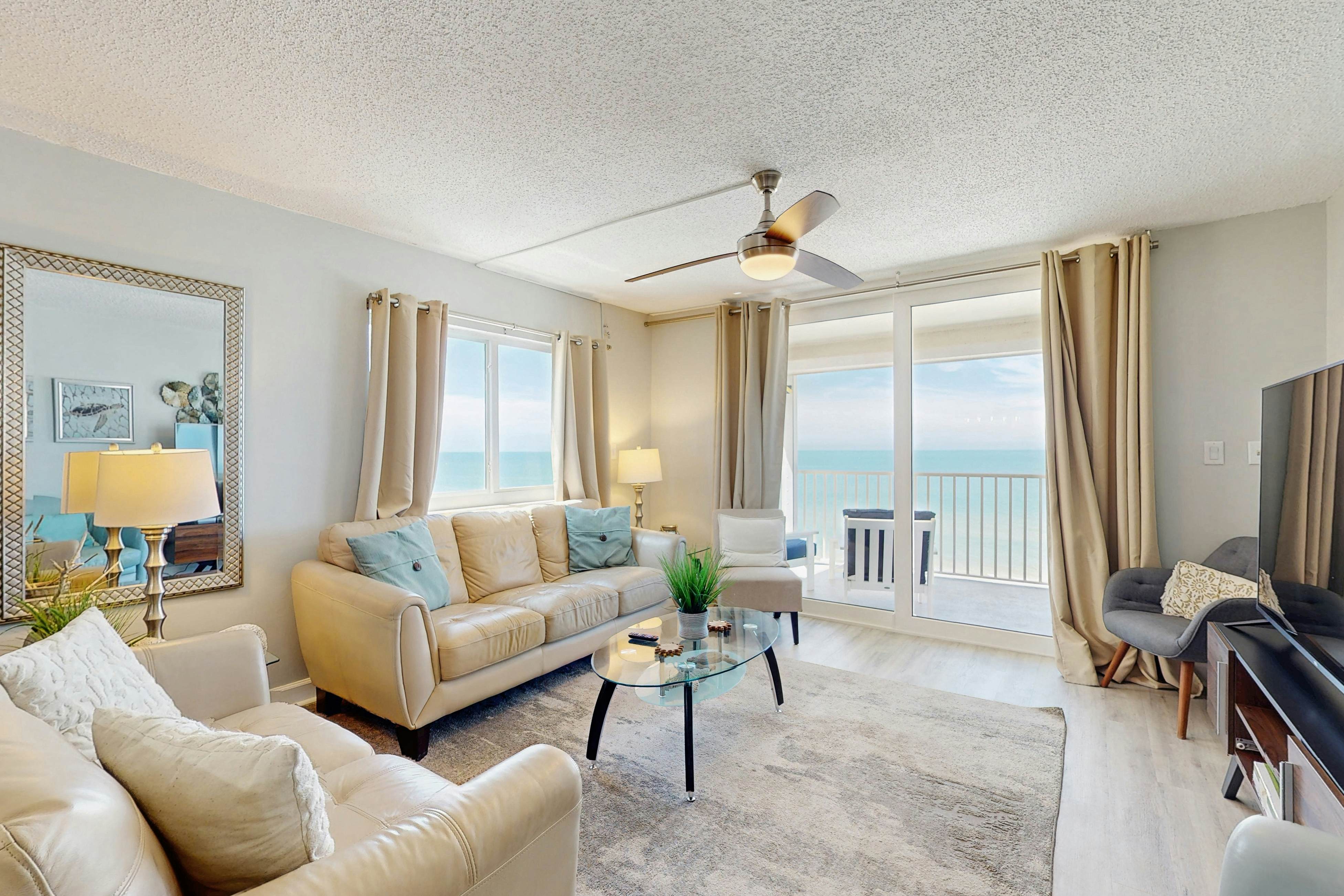 Direct beachfront beauty with sweeping coastal views