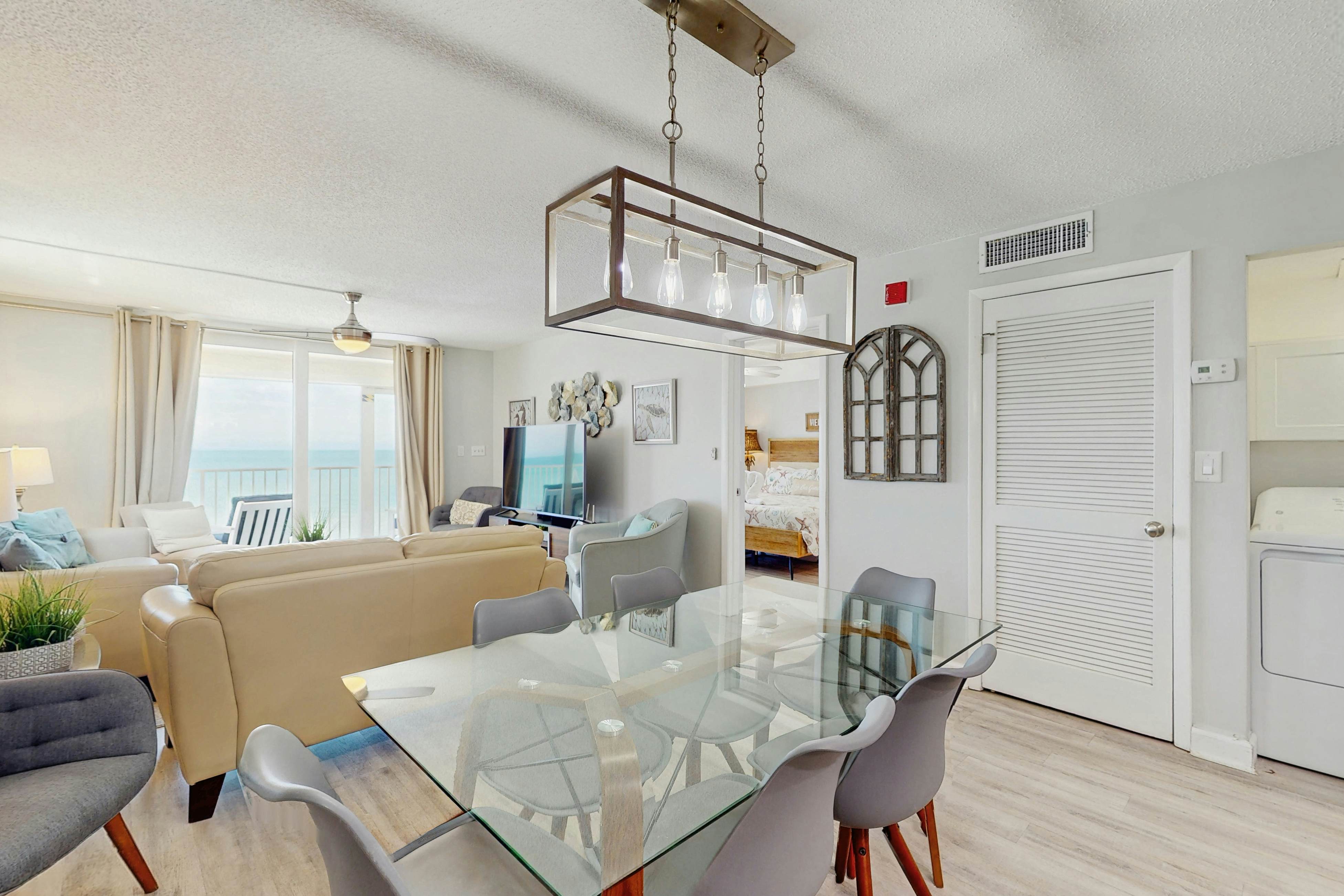 Direct beachfront beauty with sweeping coastal views