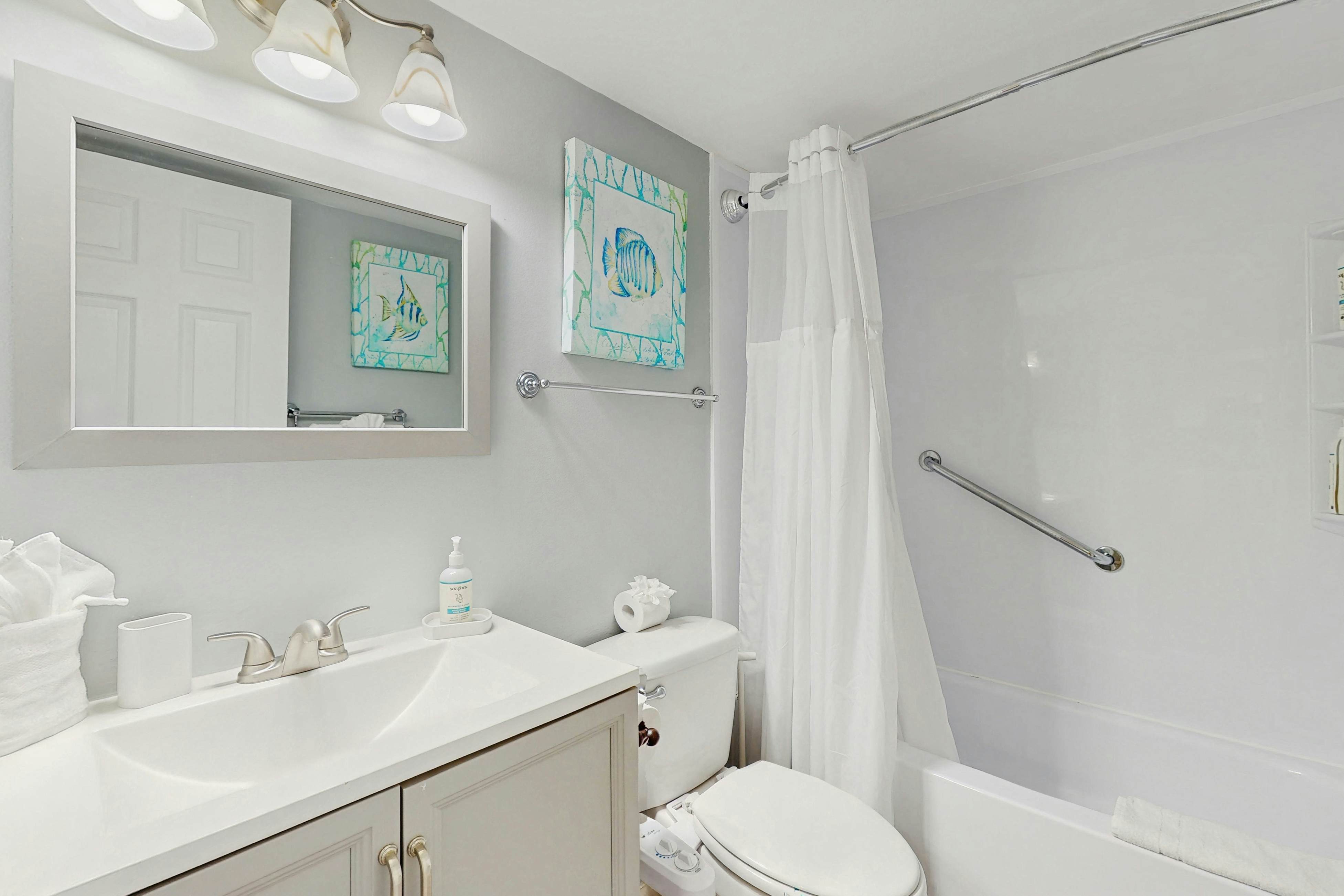 Direct beachfront beauty with sweeping coastal views