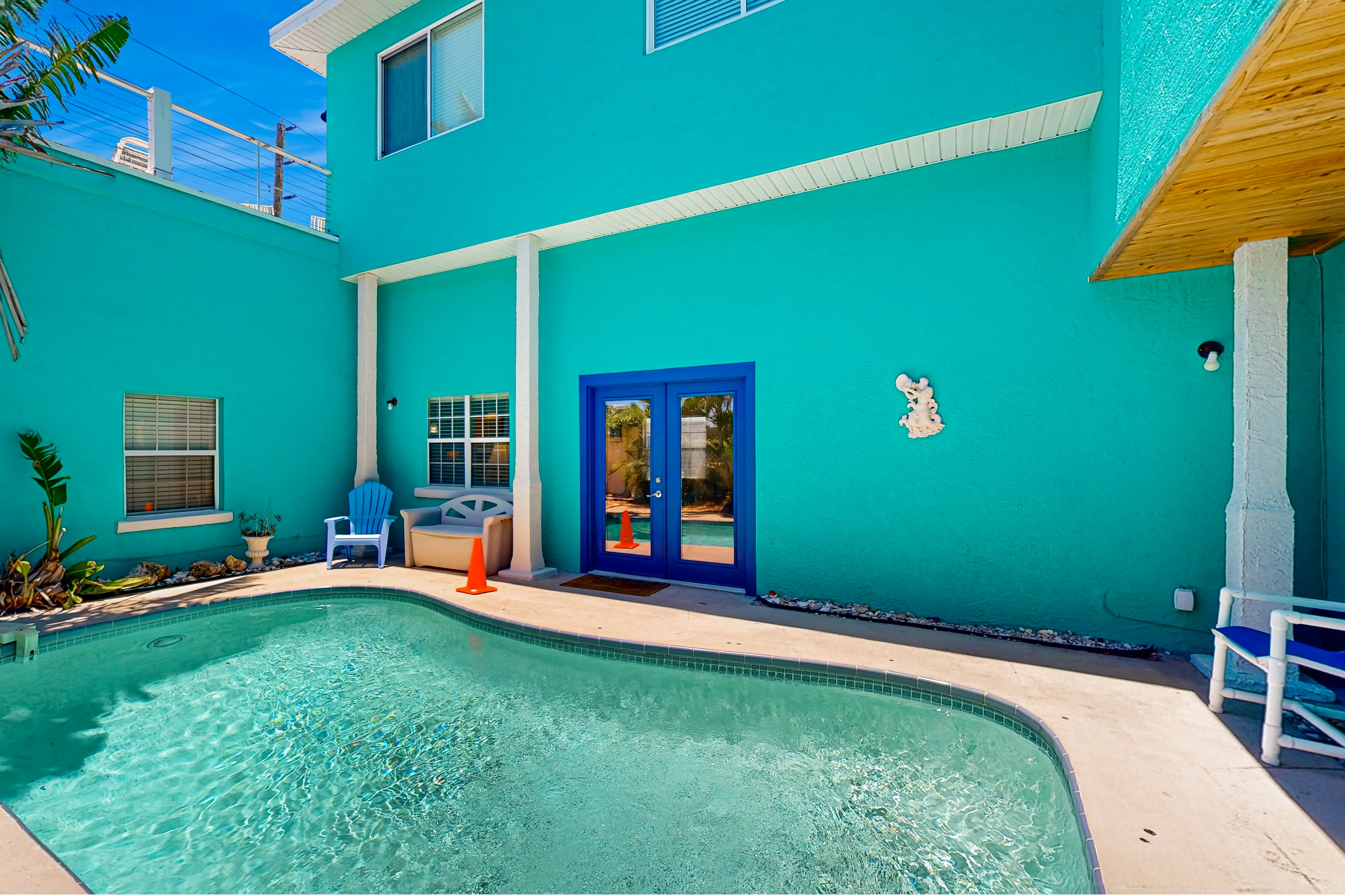 Treasure Island paradise with pool and Gulf view deck steps to Sunset Beach