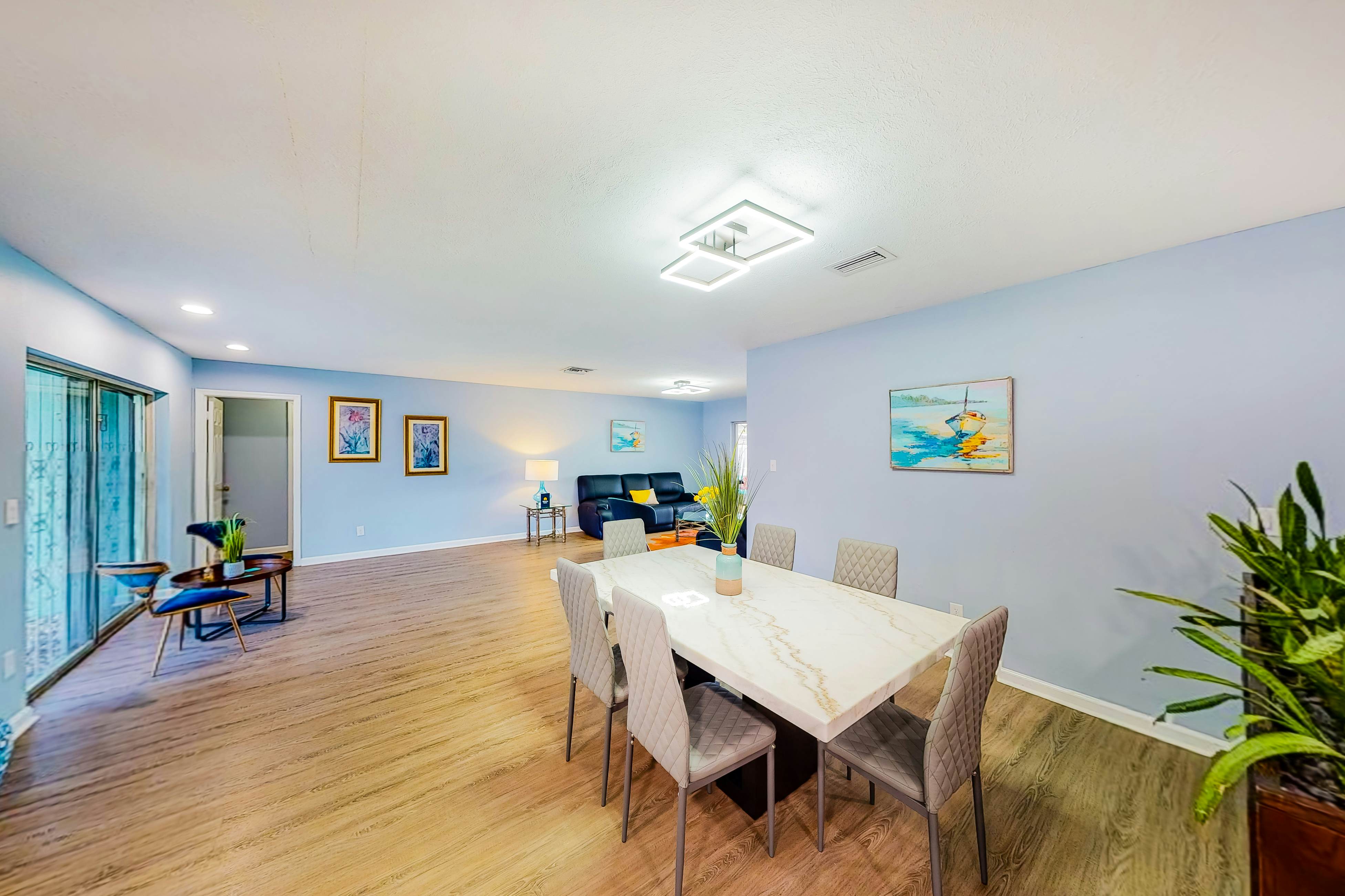 Dog-friendly house with water view, dock, & beach access - snowbirds welcome