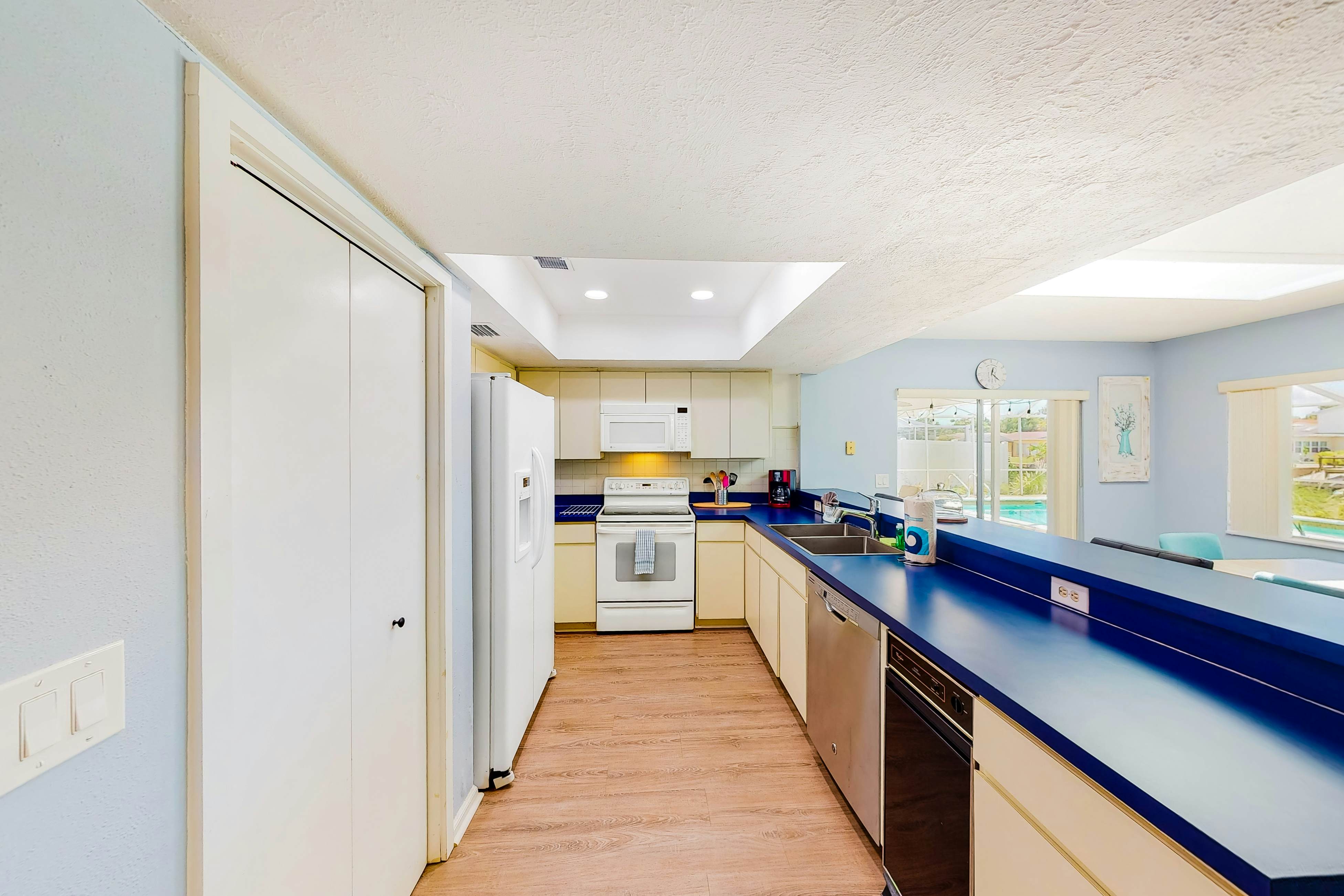 Dog-friendly house with water view, dock, & beach access - snowbirds welcome