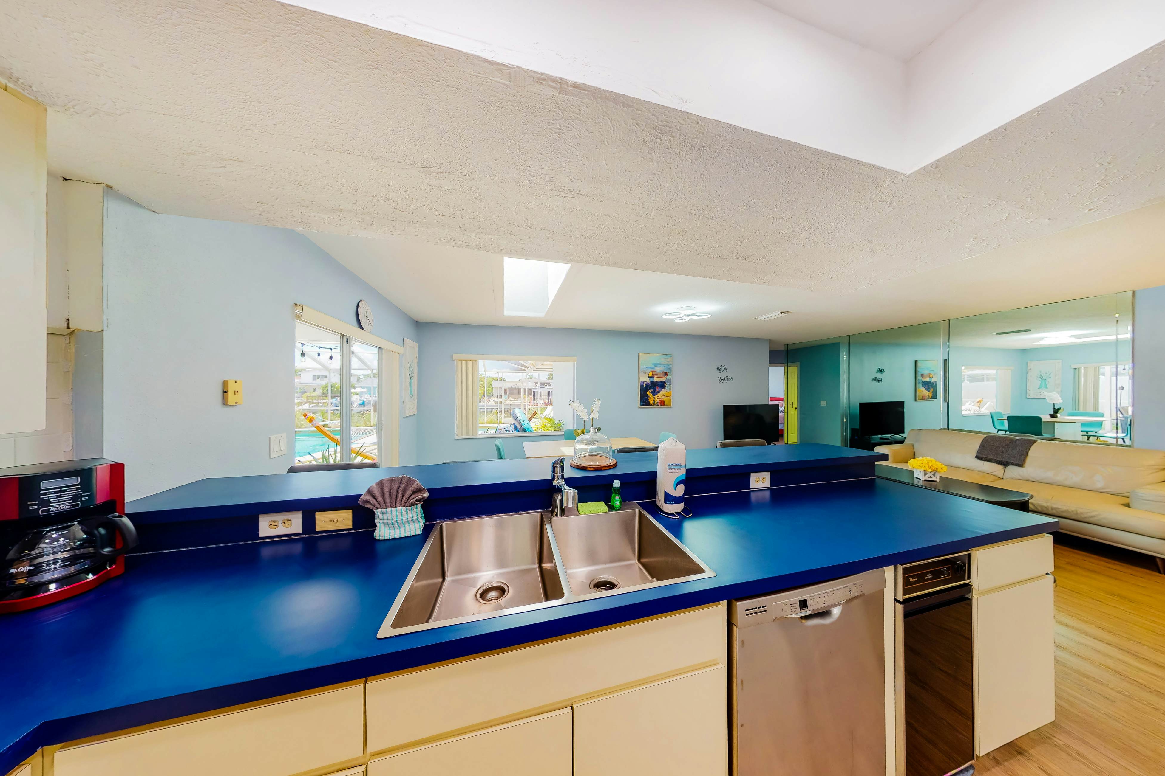 Dog-friendly house with water view, dock, & beach access - snowbirds welcome