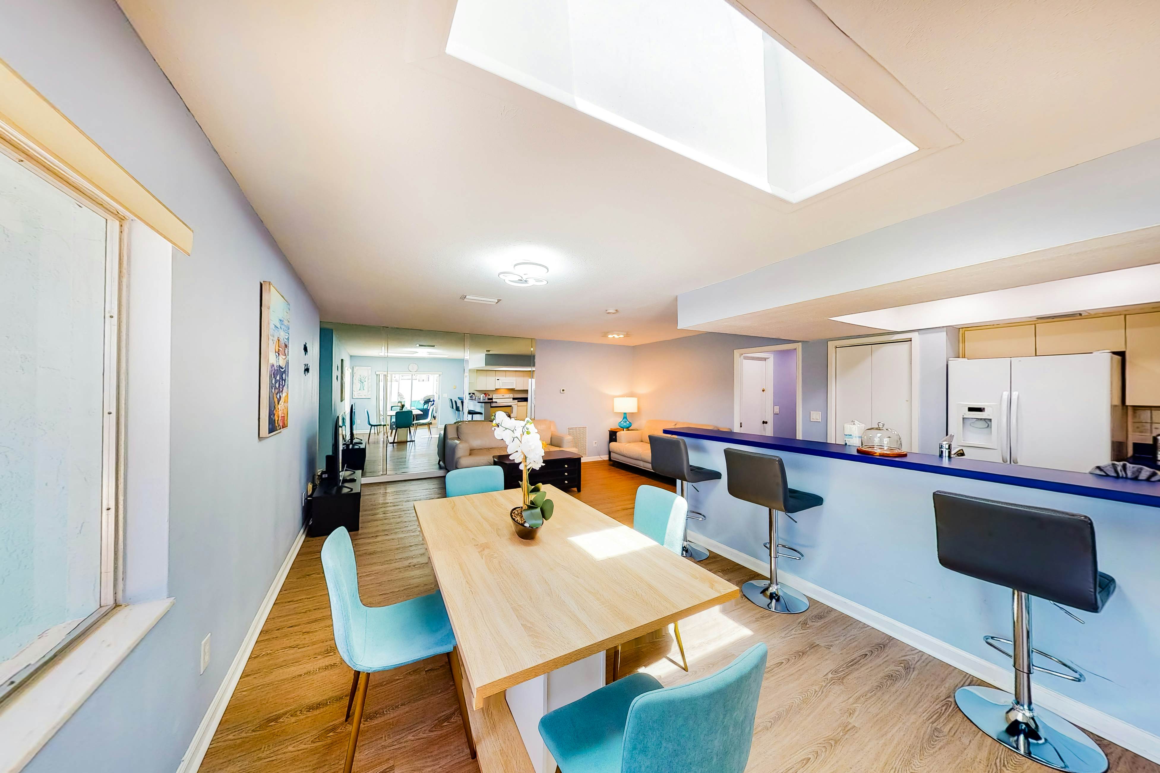 Dog-friendly house with water view, dock, & beach access - snowbirds welcome