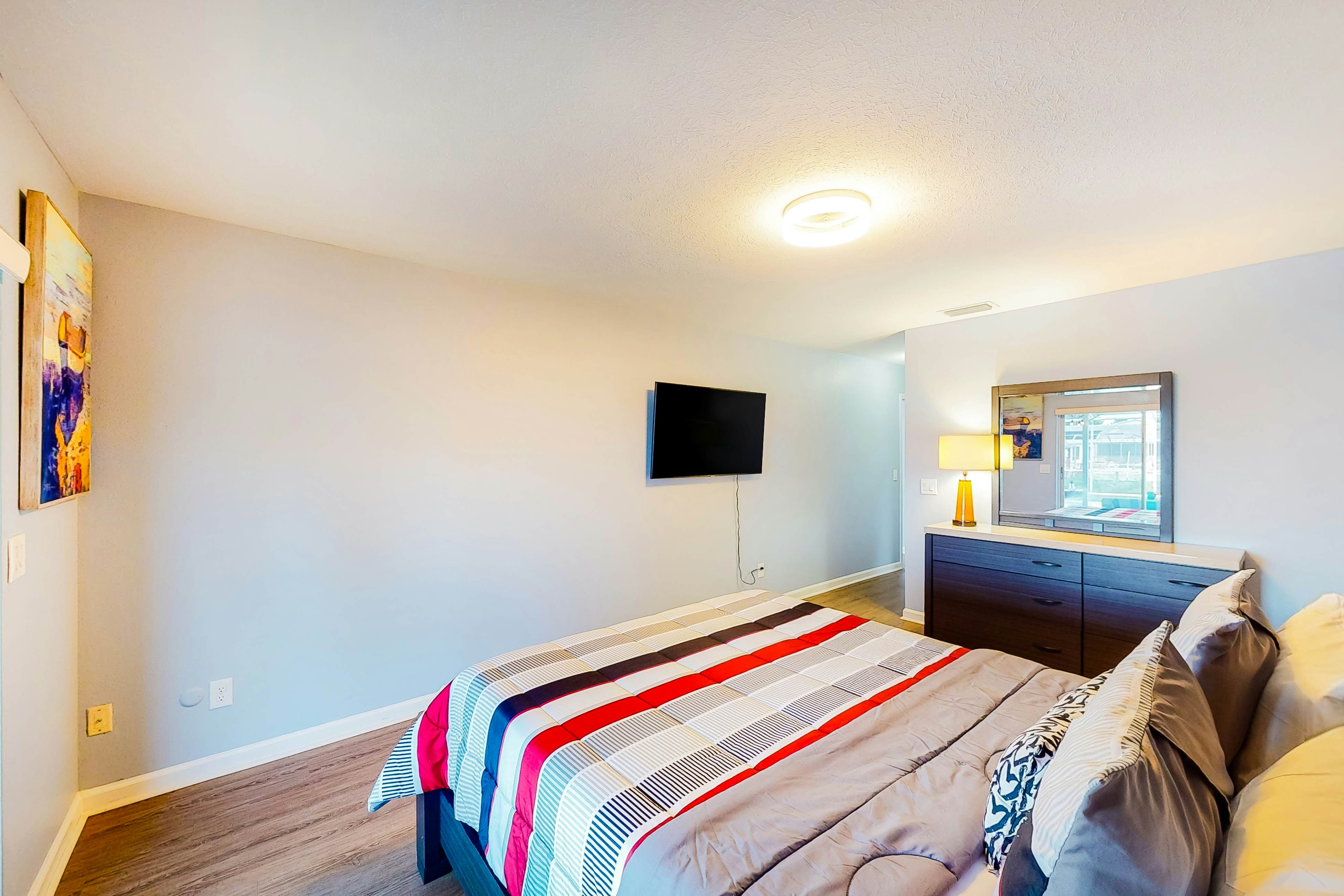 Dog-friendly house with water view, dock, & beach access - snowbirds welcome