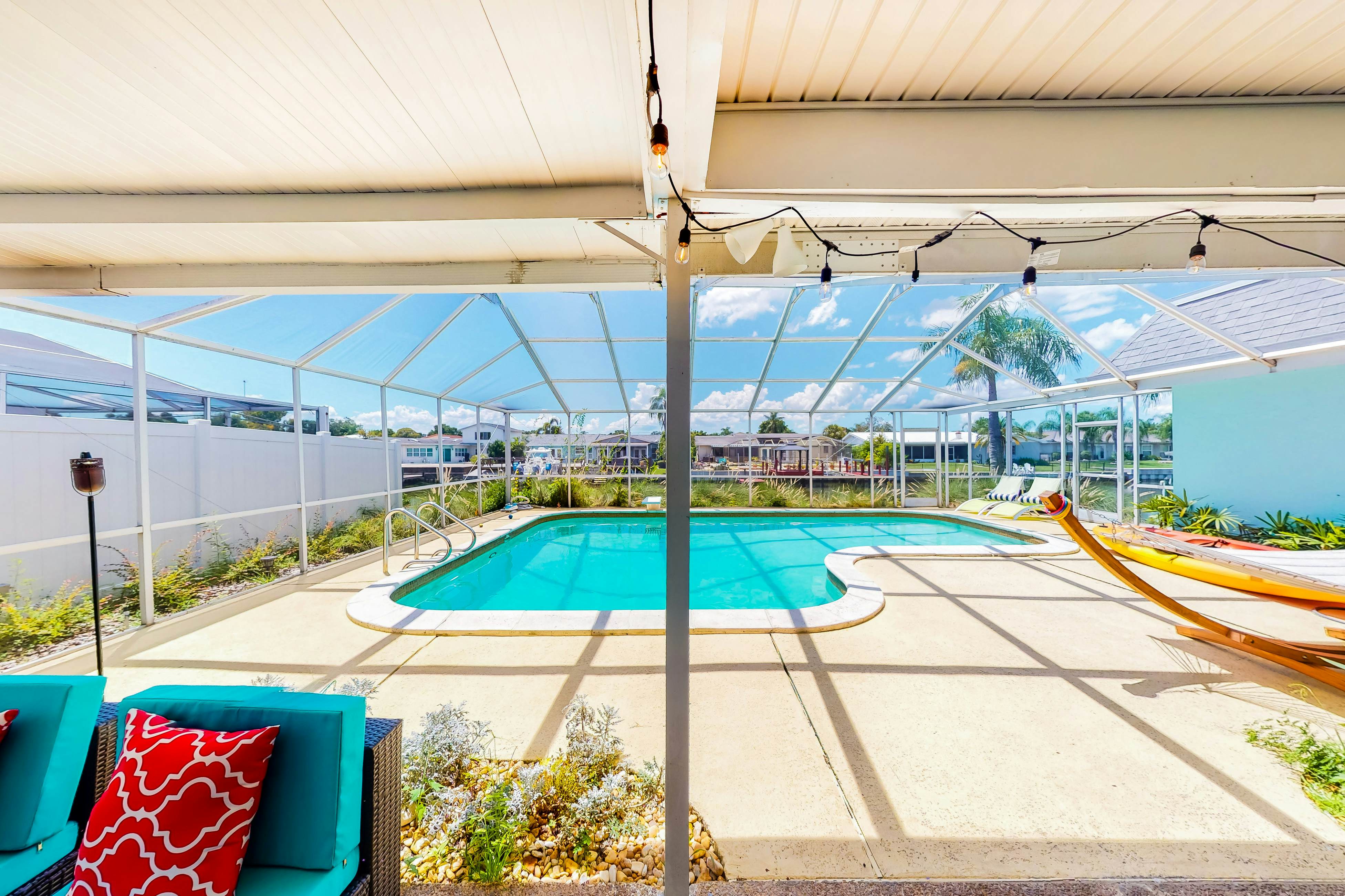 Dog-friendly house with water view, dock, & beach access - snowbirds welcome