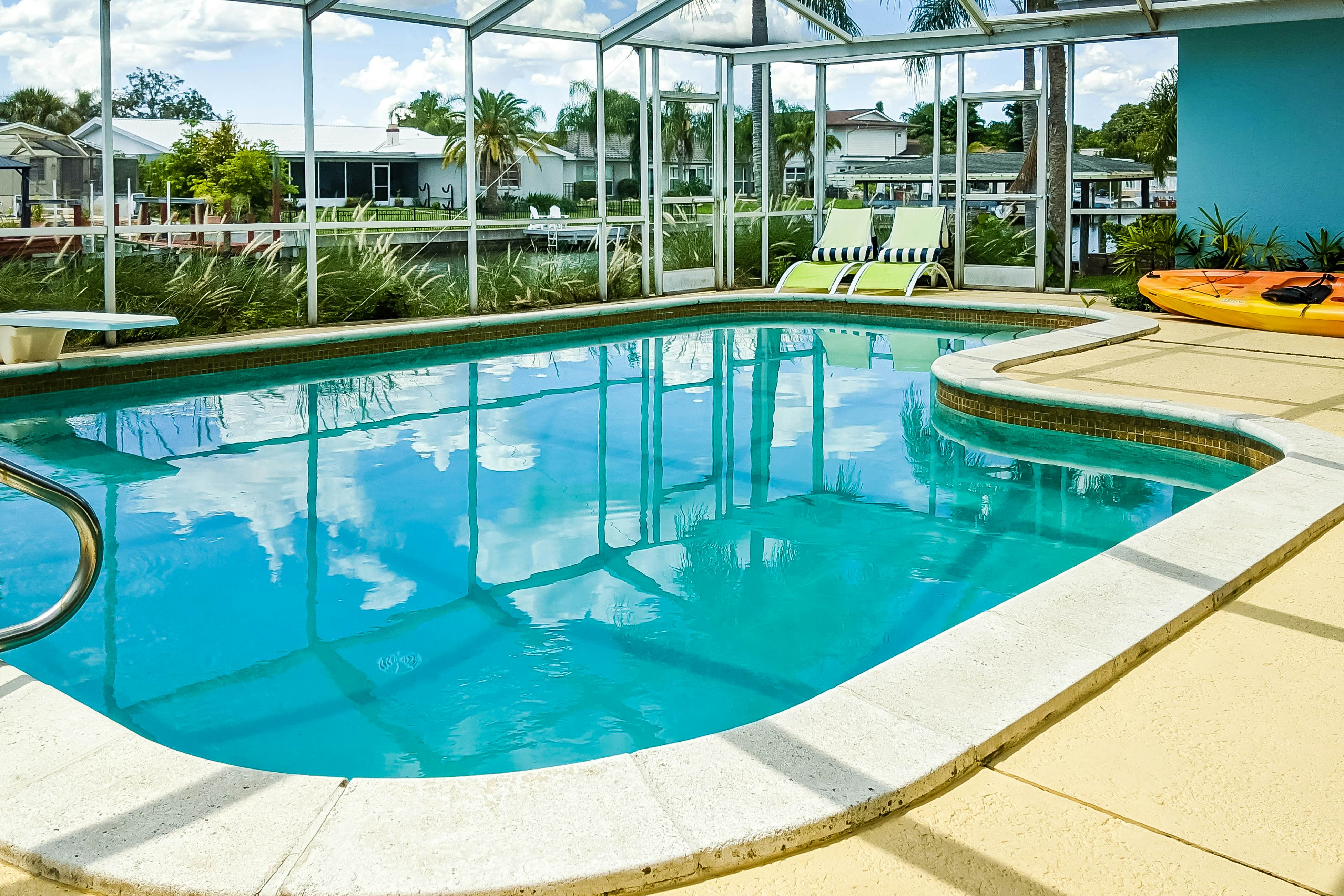 Dog-friendly house with water view, dock, & beach access - snowbirds welcome