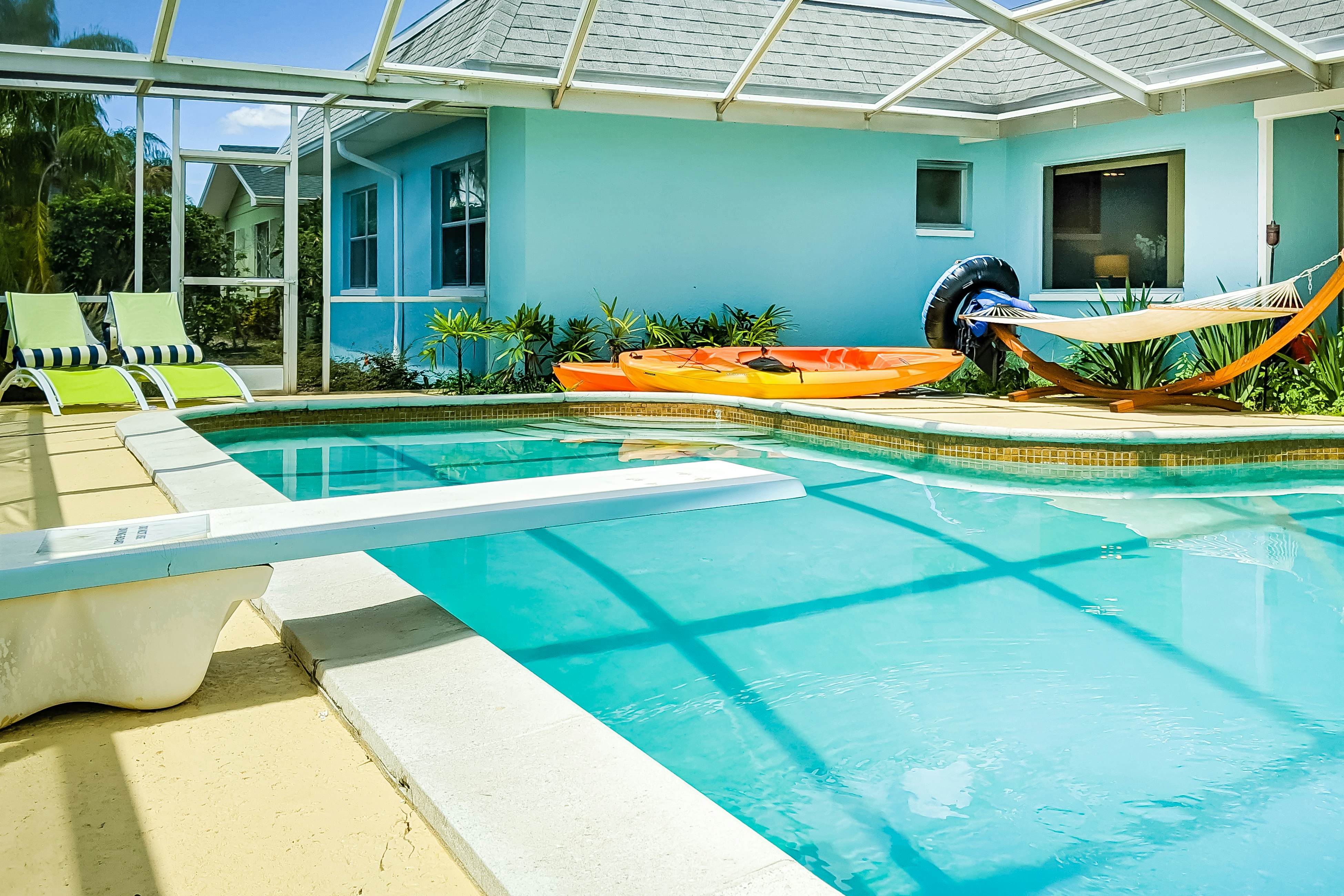 Dog-friendly house with water view, dock, & beach access - snowbirds welcome