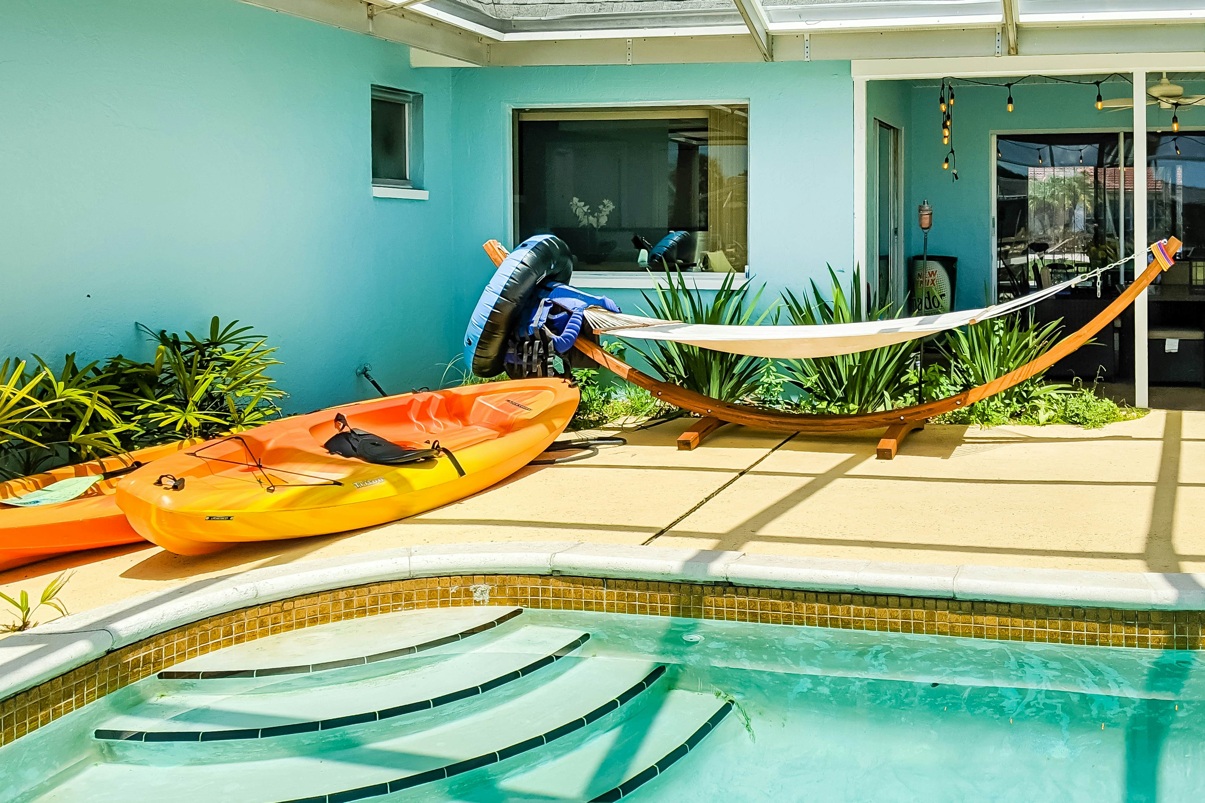 Dog-friendly house with water view, dock, & beach access - snowbirds welcome