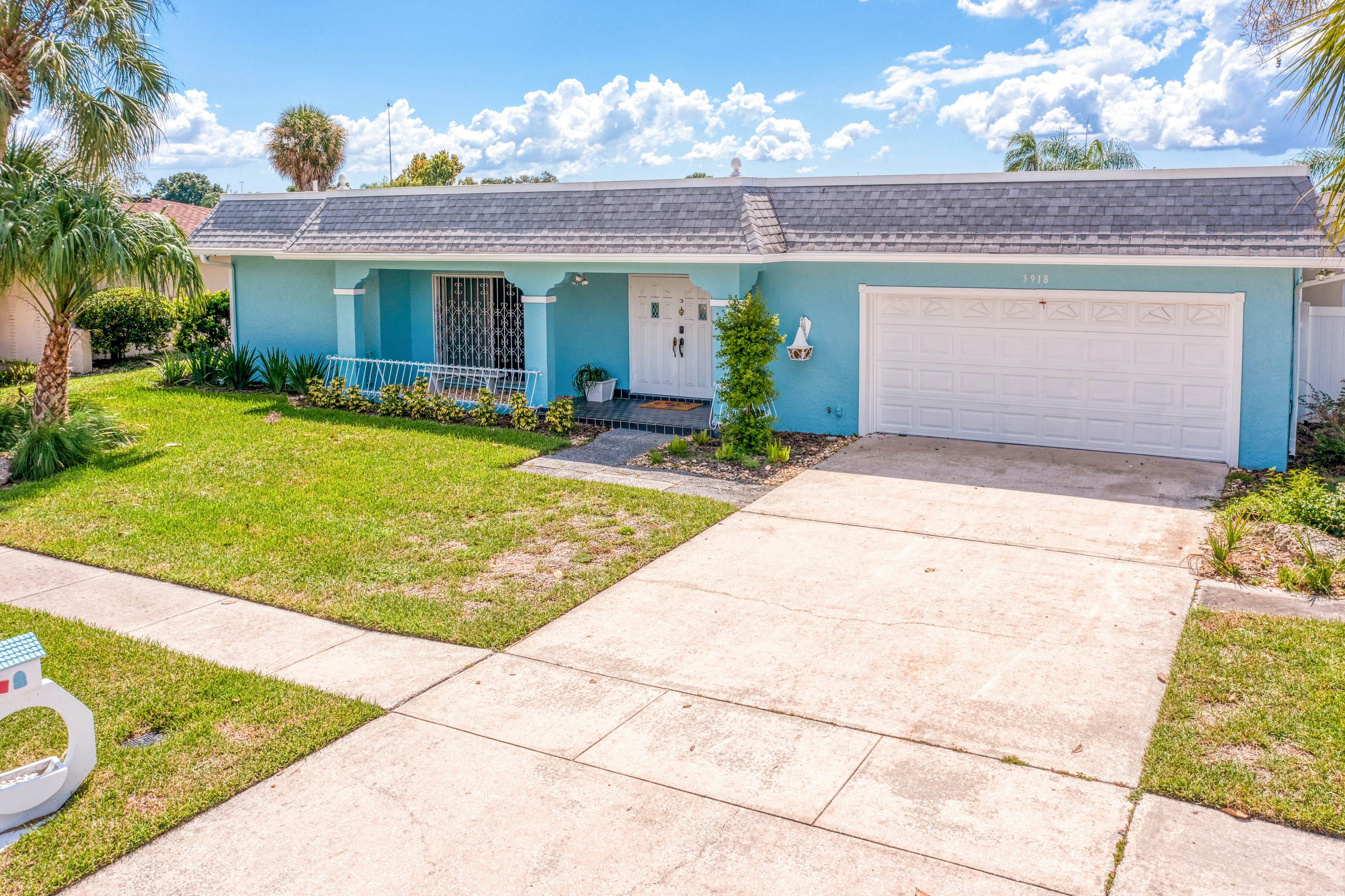 Dog-friendly house with water view, dock, & beach access - snowbirds welcome