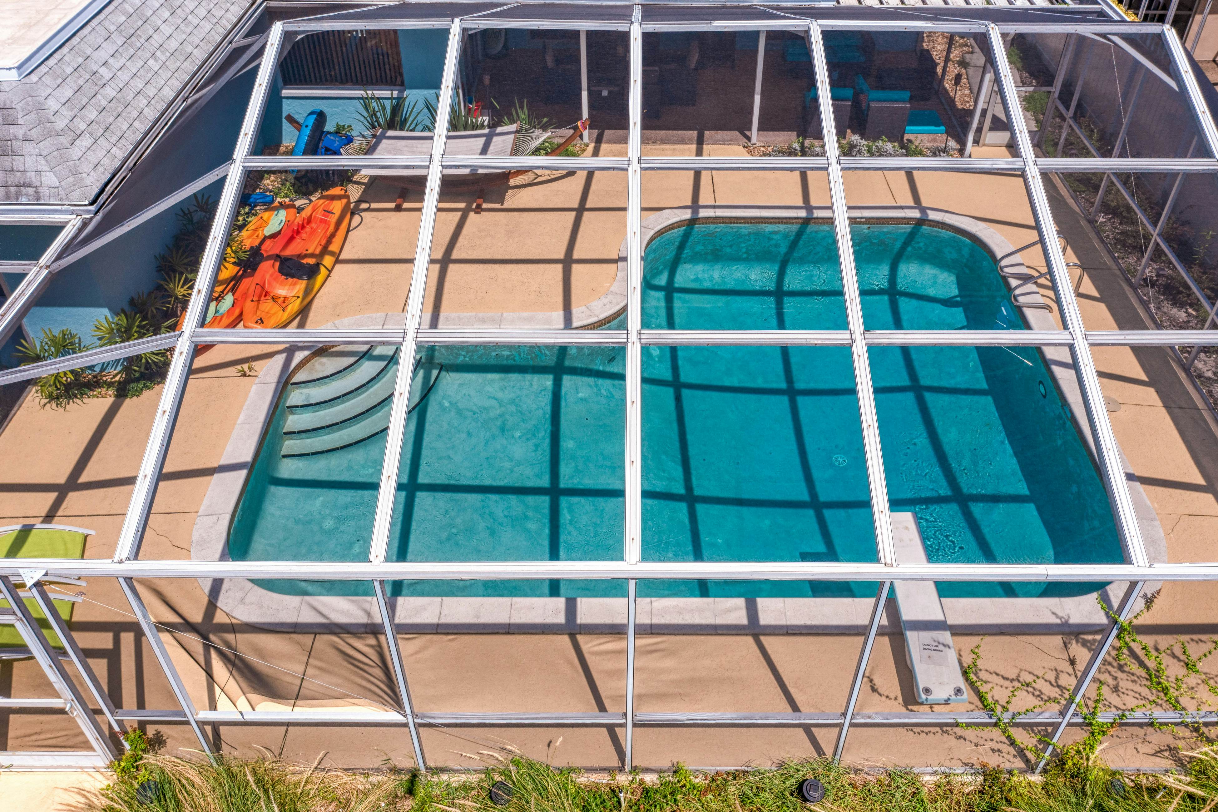 Dog-friendly house with water view, dock, & beach access - snowbirds welcome