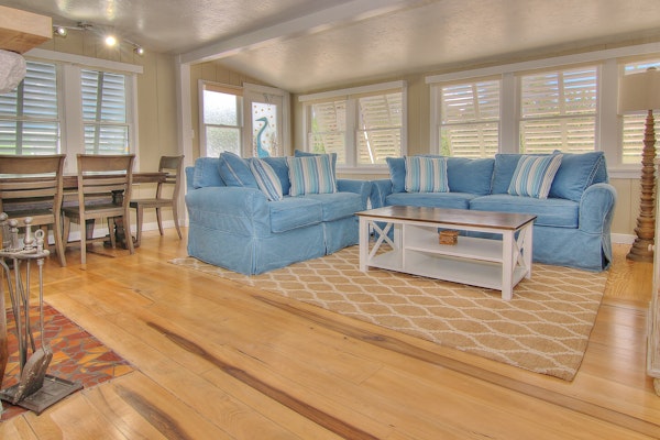 Modern beach cottage steps to beach with fireplace WD and AC near dining and fun