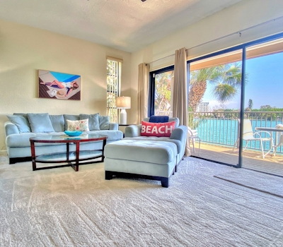 Coastal condo with multiple balconies and dock intracoastal waterway views
