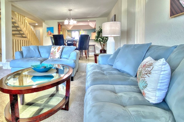 Coastal condo with multiple balconies and dock intracoastal waterway views