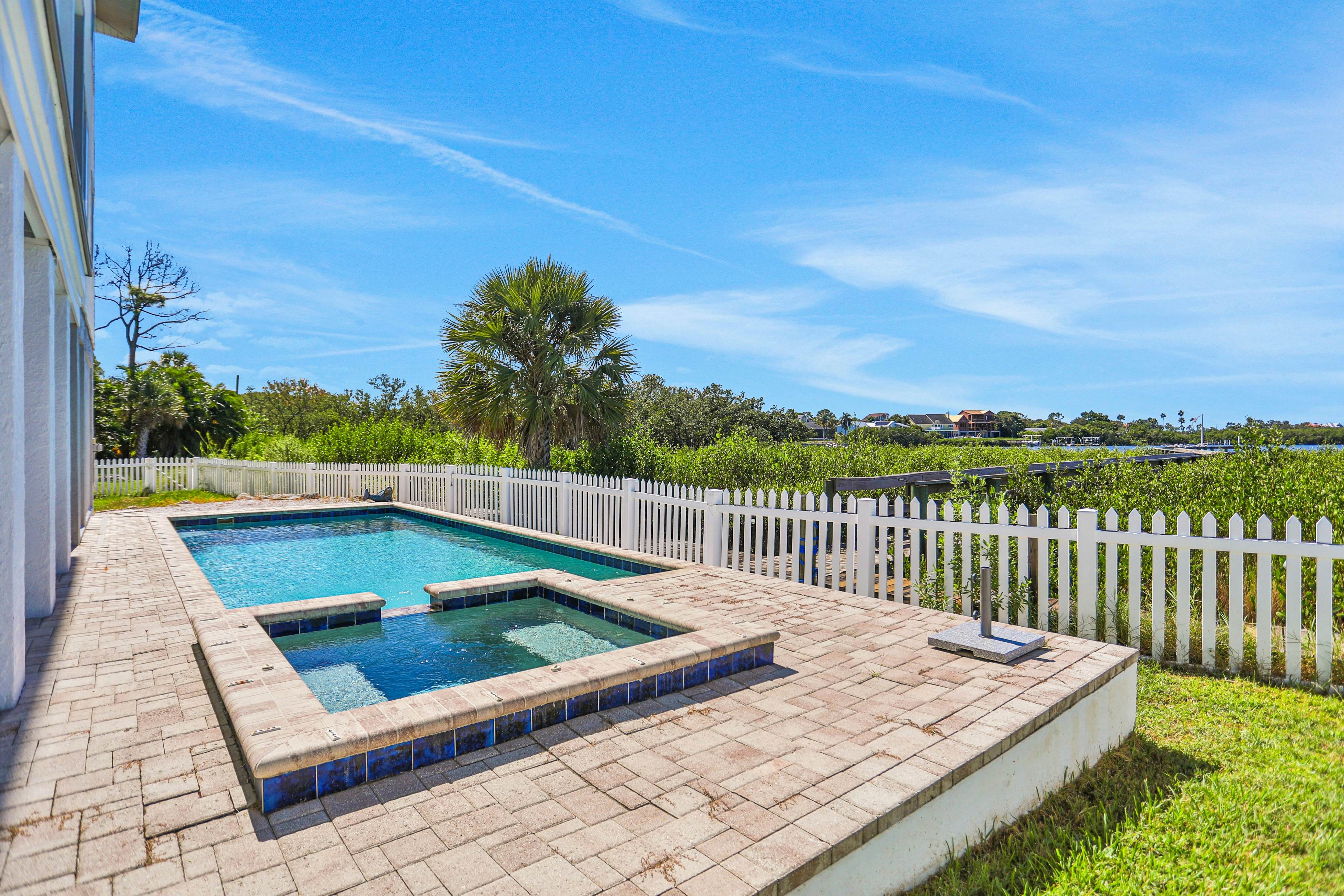Luxurious waterfront home w pool game room dock