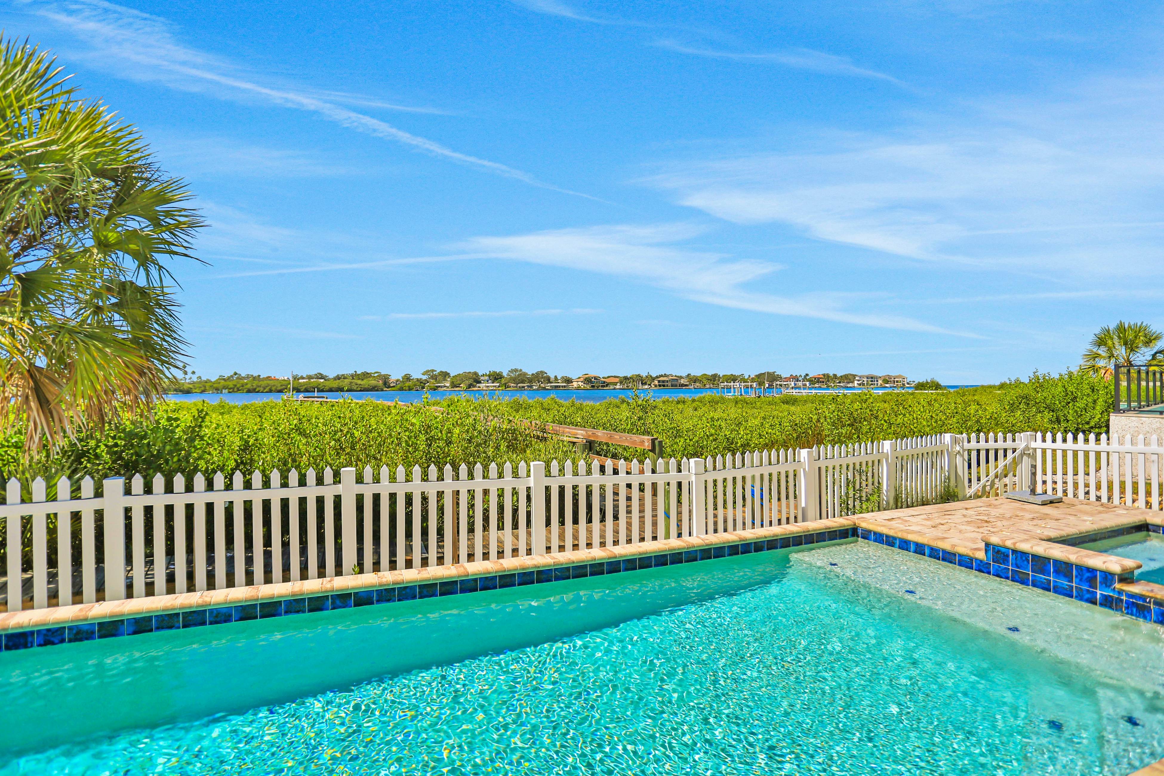 Luxurious waterfront home w pool game room dock