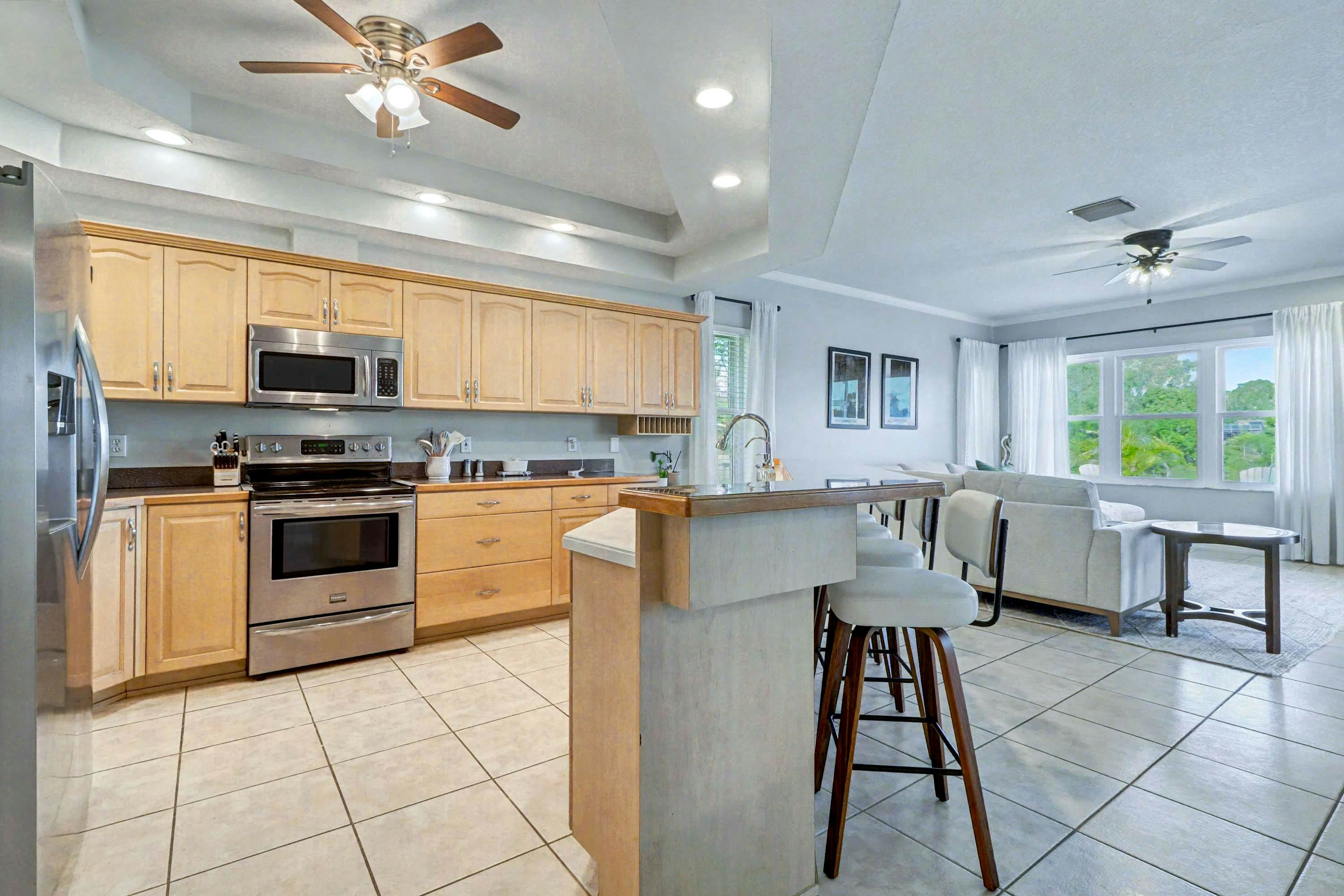 Palm Harbor Retreat with Pool, Firepit, Pool Table & Pet-Friendly