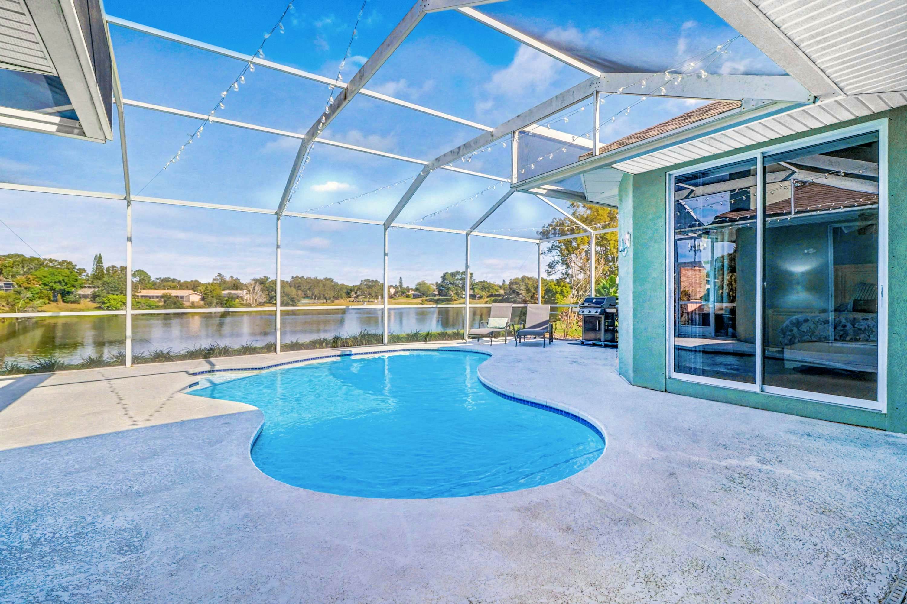 Palm Harbor Retreat with Pool, Firepit, Pool Table & Pet-Friendly