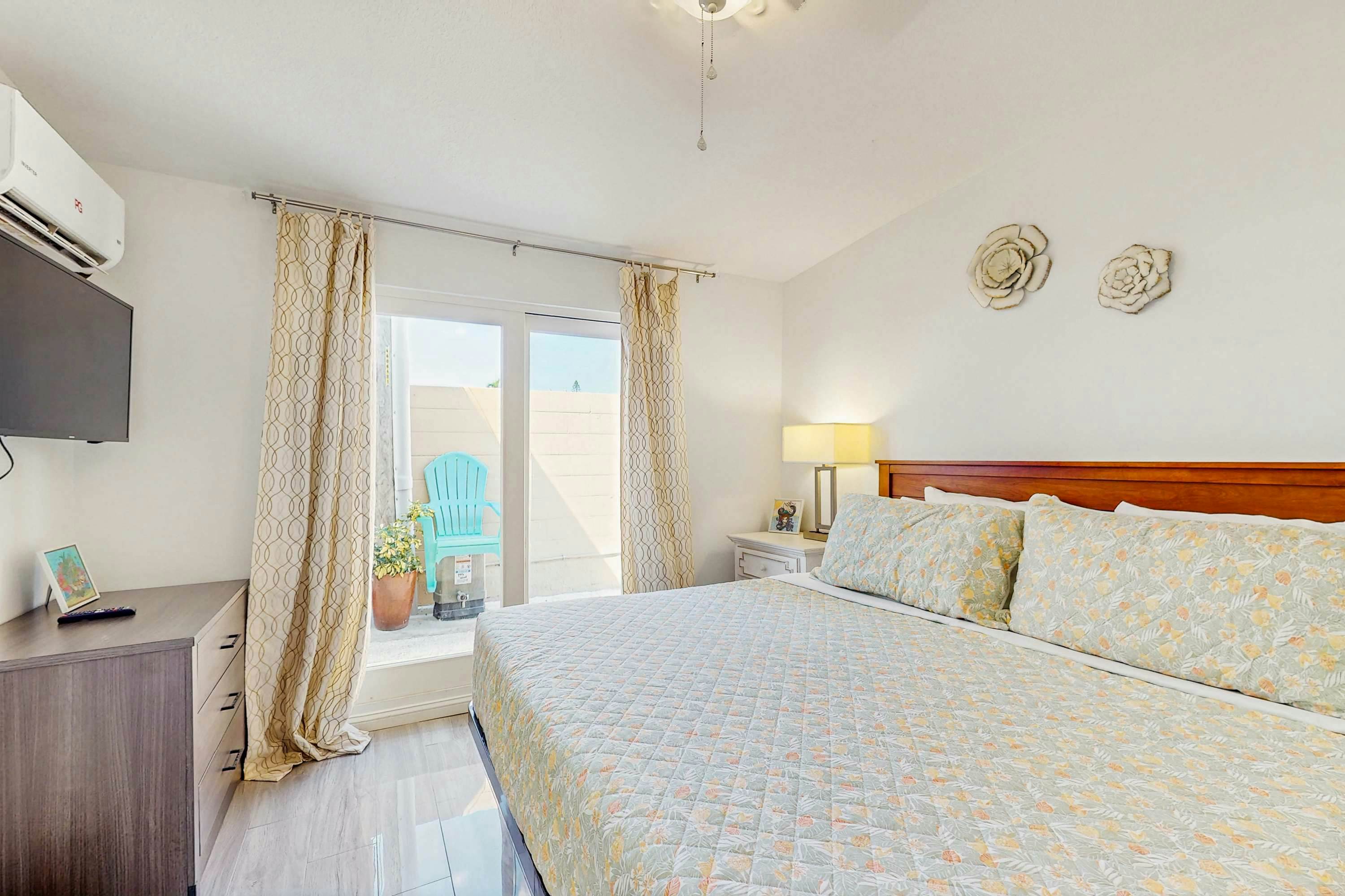 Beachfront condo with pool and island vibes