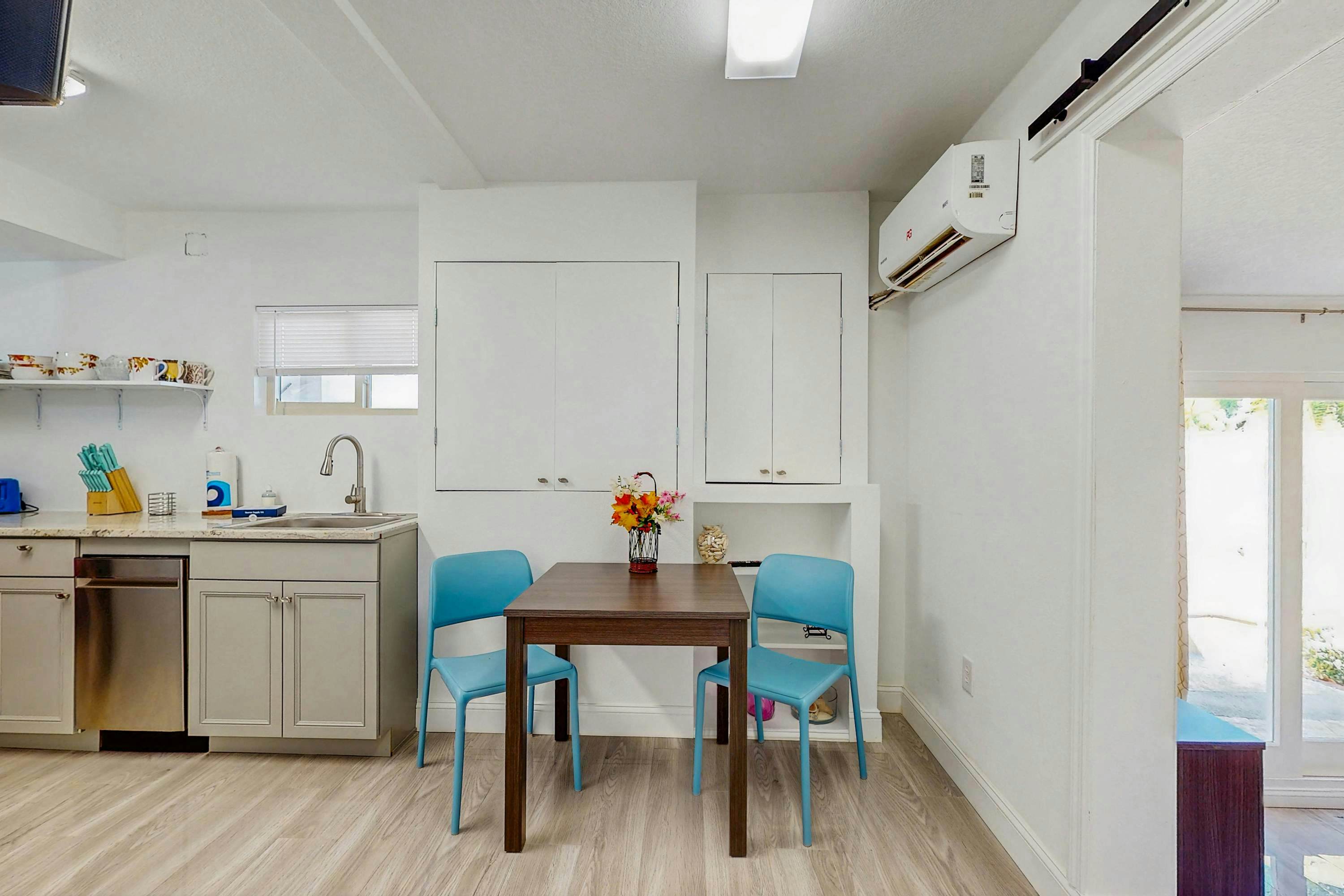 Beachfront condo with pool and island vibes