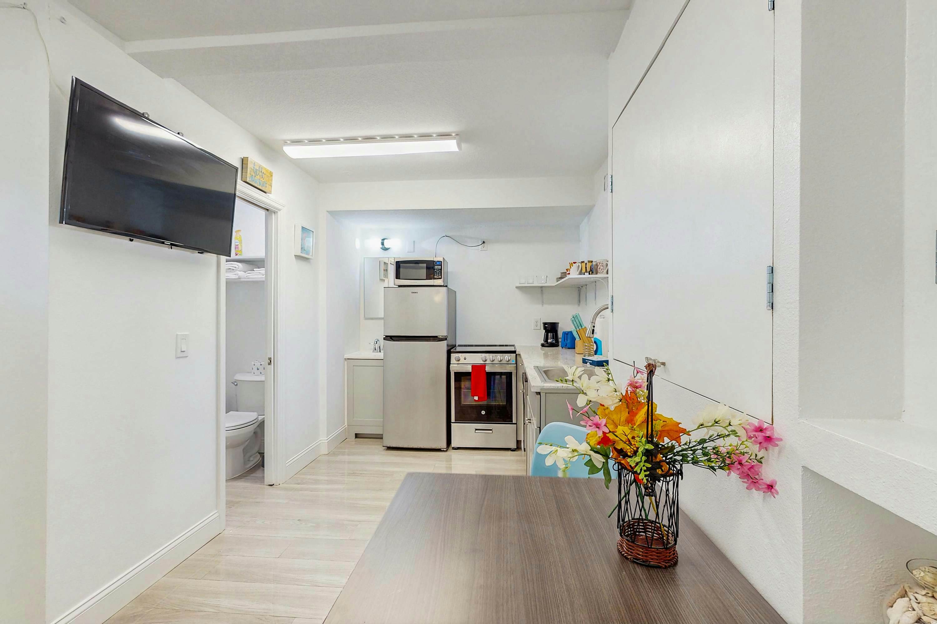 Beachfront condo with pool and island vibes