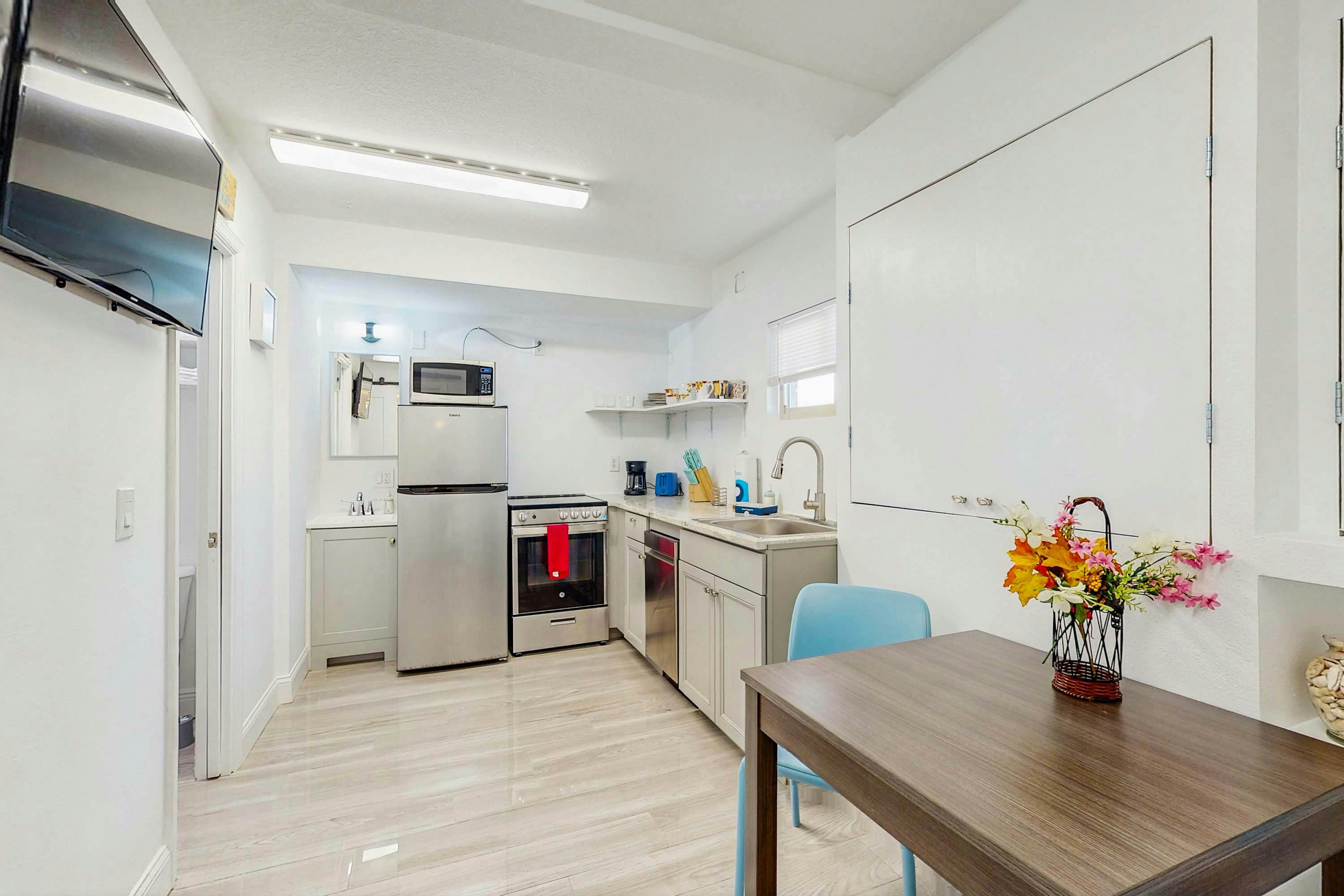 Beachfront condo with pool and island vibes