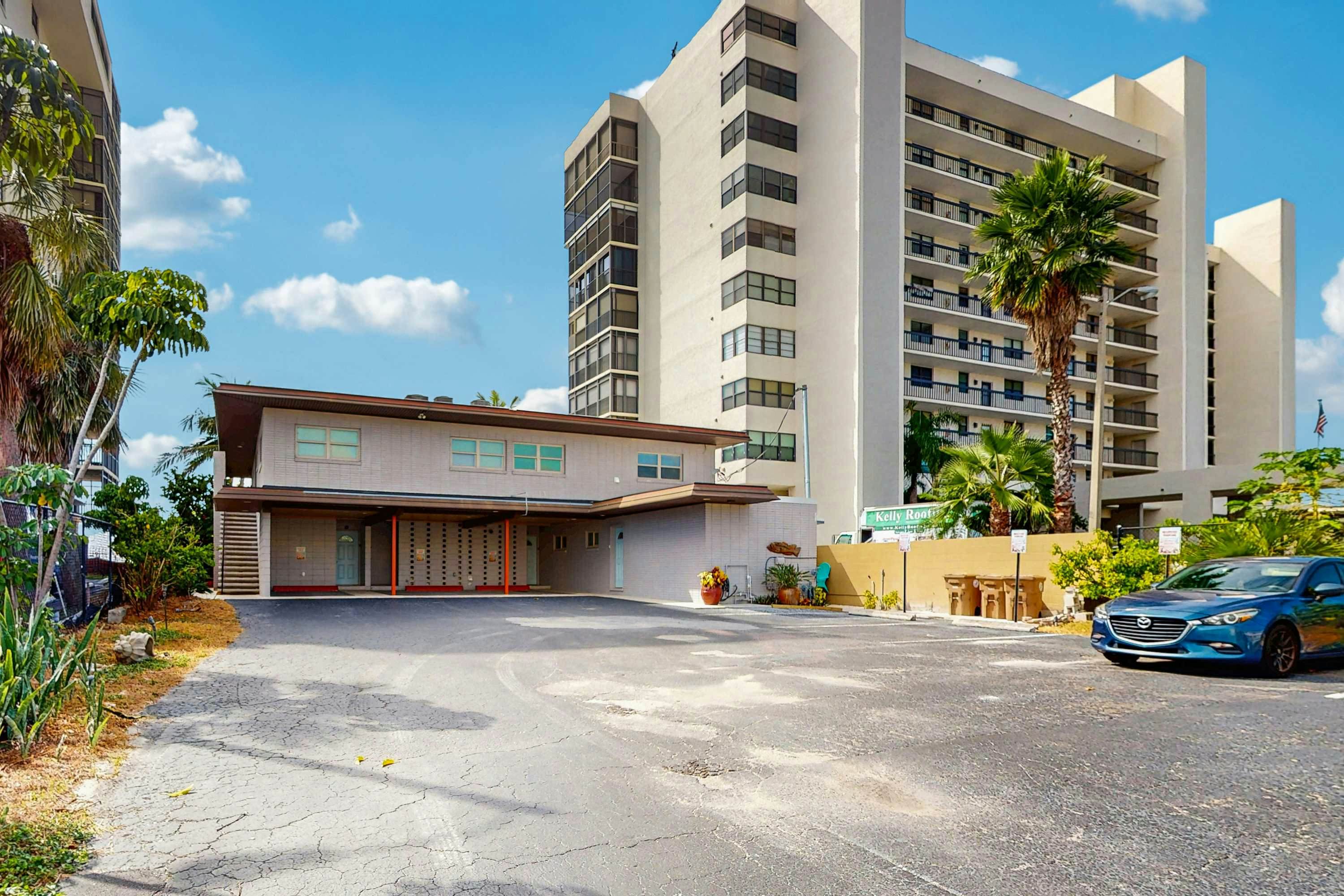Beachfront condo with pool and island vibes
