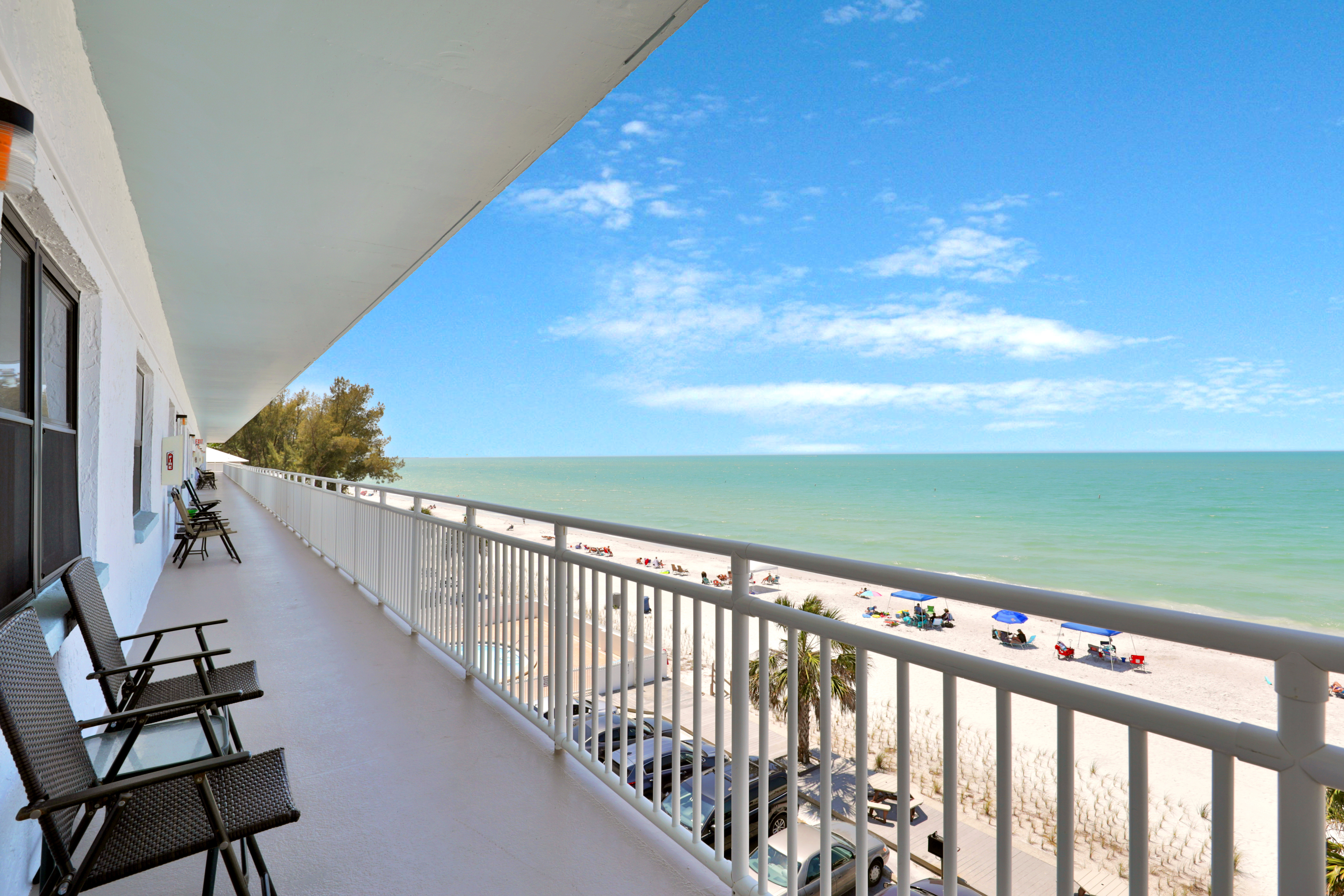 Bright Gulf front condo just steps from the beach