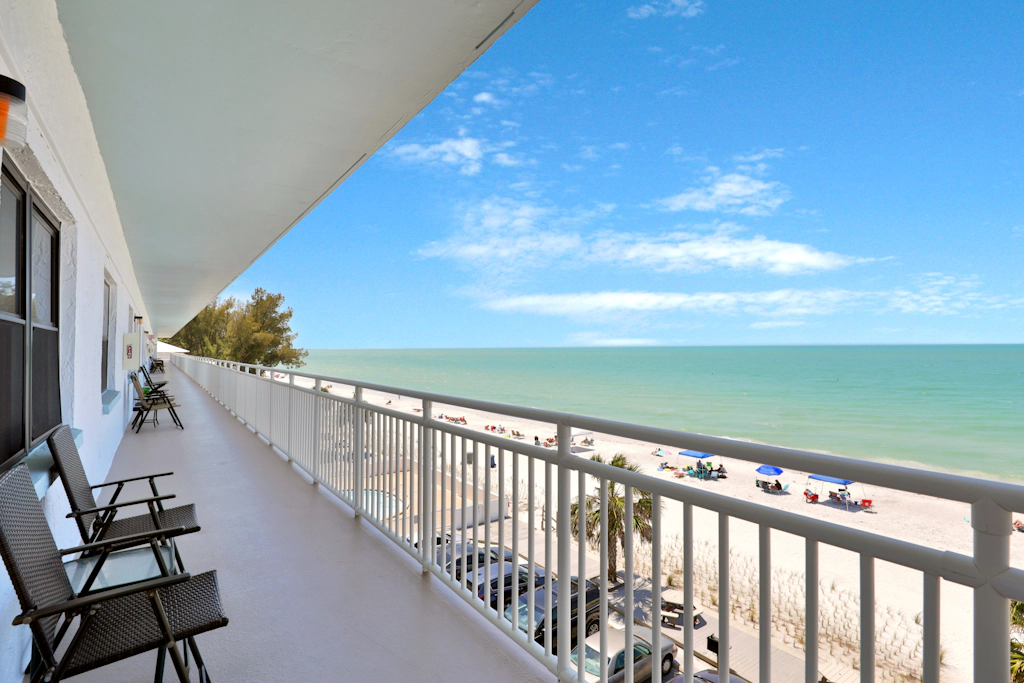 Bright Gulf front condo just steps from the beach