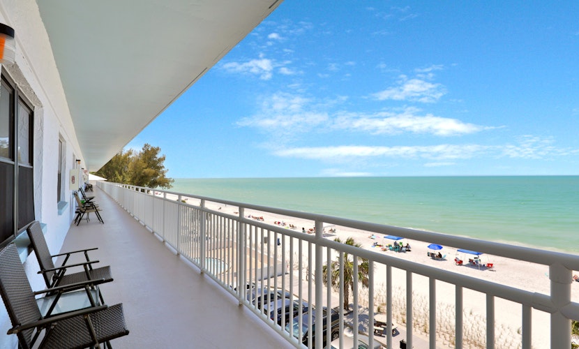 Bright Gulf front condo just steps from the beach