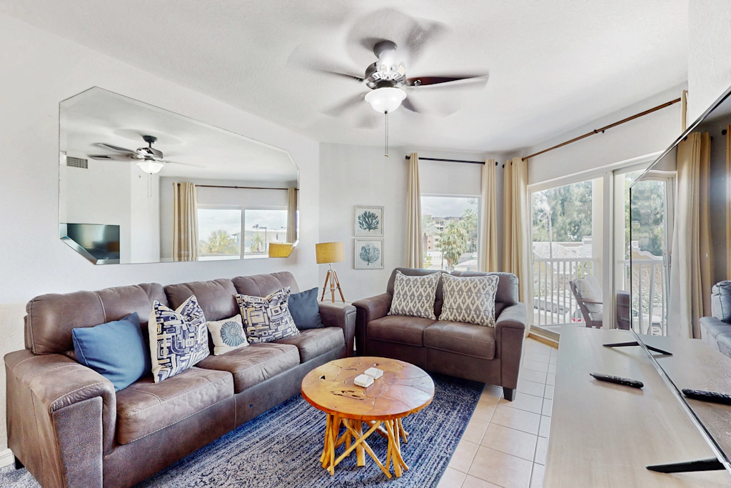 Second floor condo with beach access balcony pool hot tubs and ping pong