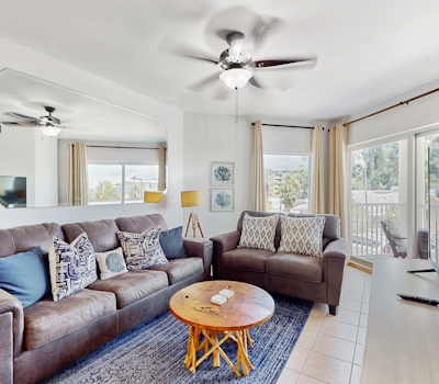 Second floor condo with beach access balcony pool hot tubs and ping pong