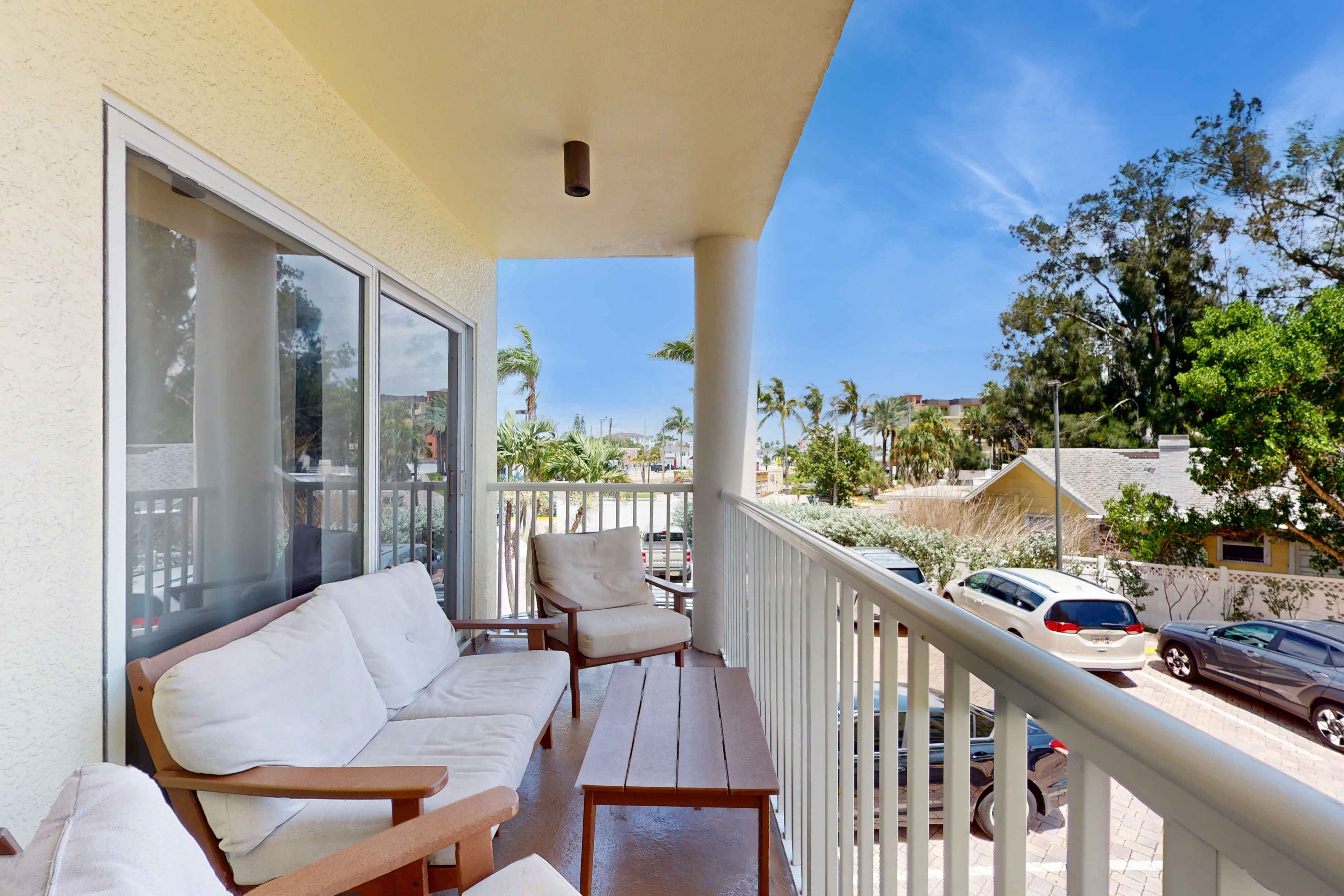 Second floor condo with beach access balcony pool hot tubs and ping pong