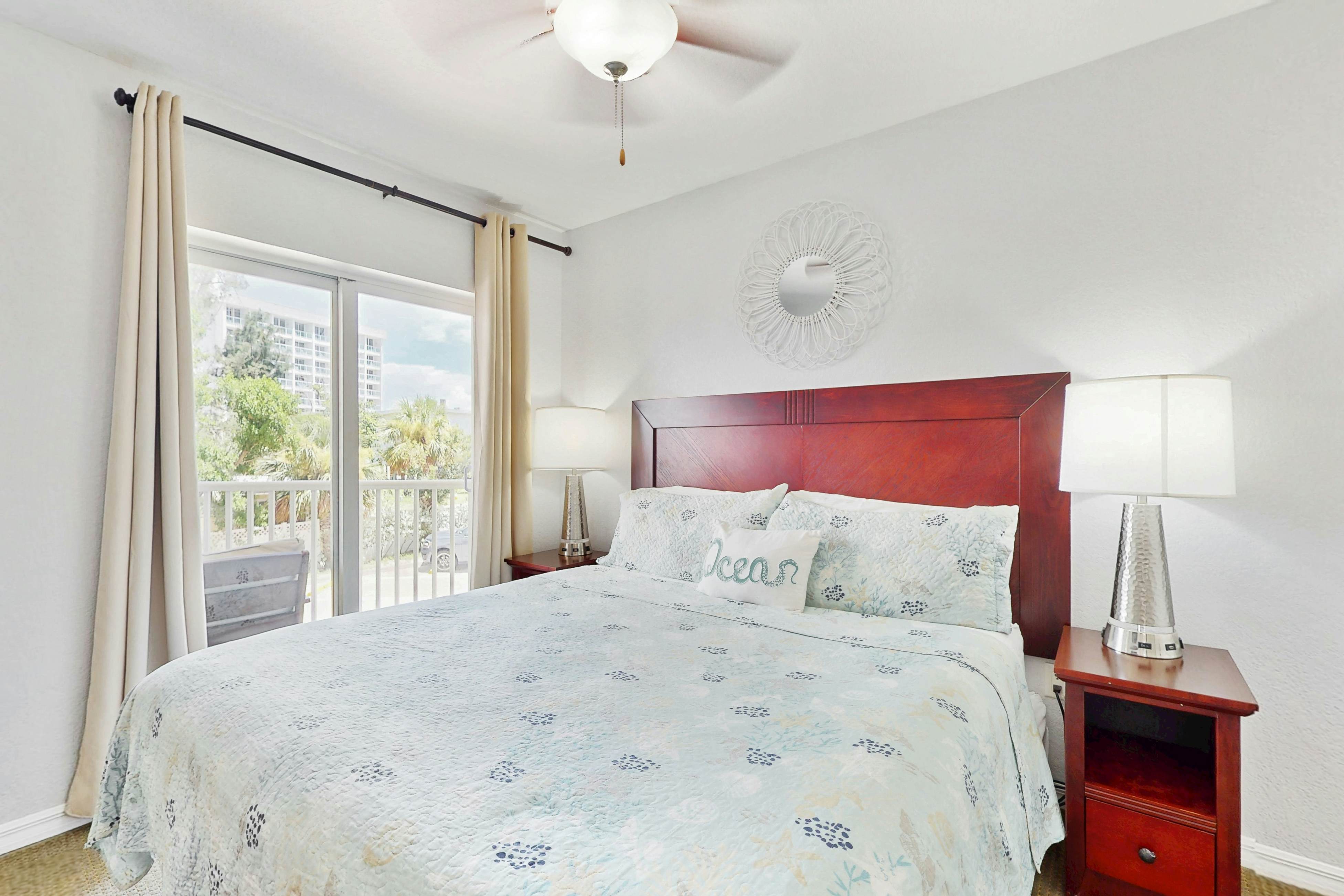 Second-floor condo with beach access, balcony, pool, hot tubs, and ping-pong