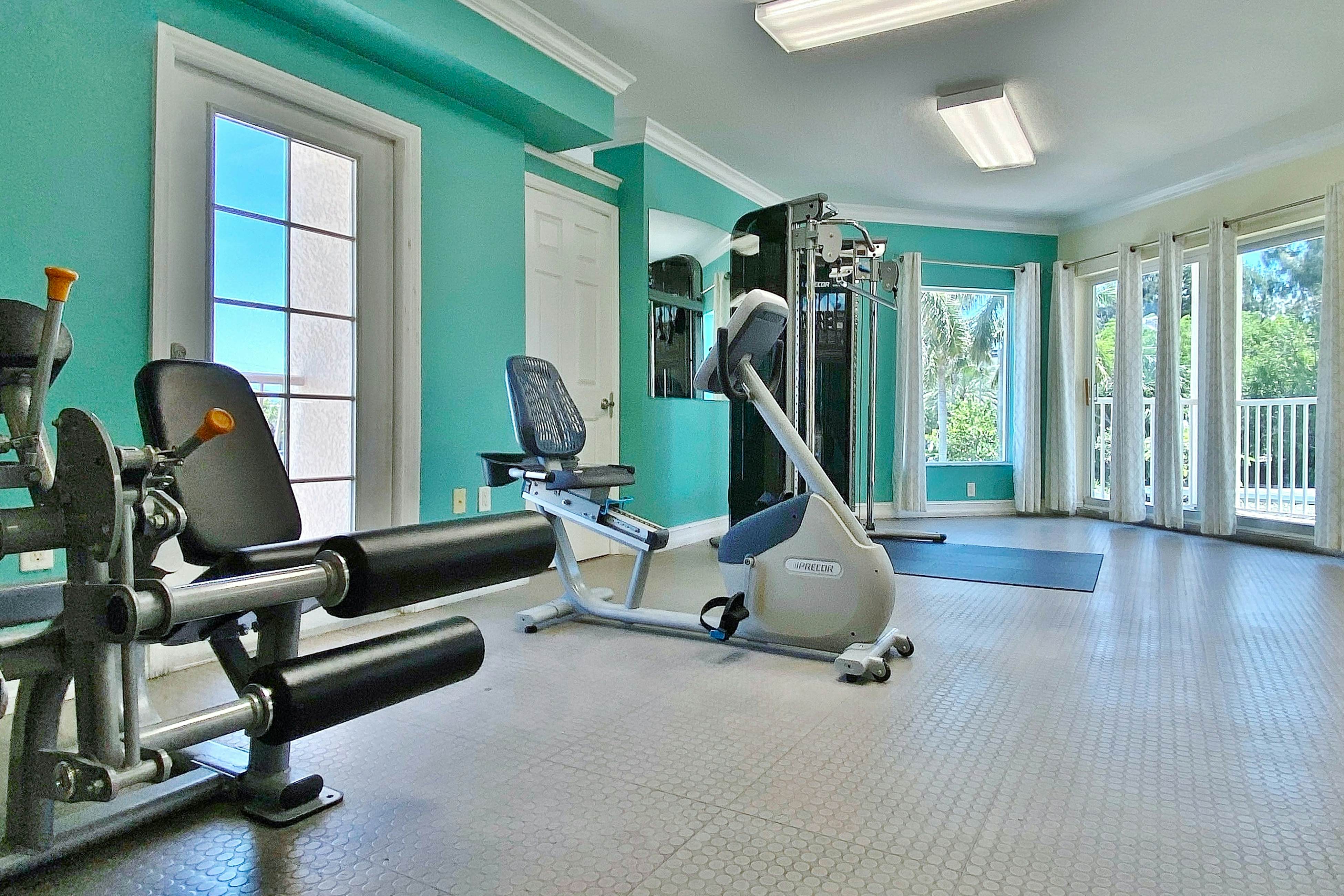 Second-floor condo with beach access, balcony, pool, hot tubs, and ping-pong