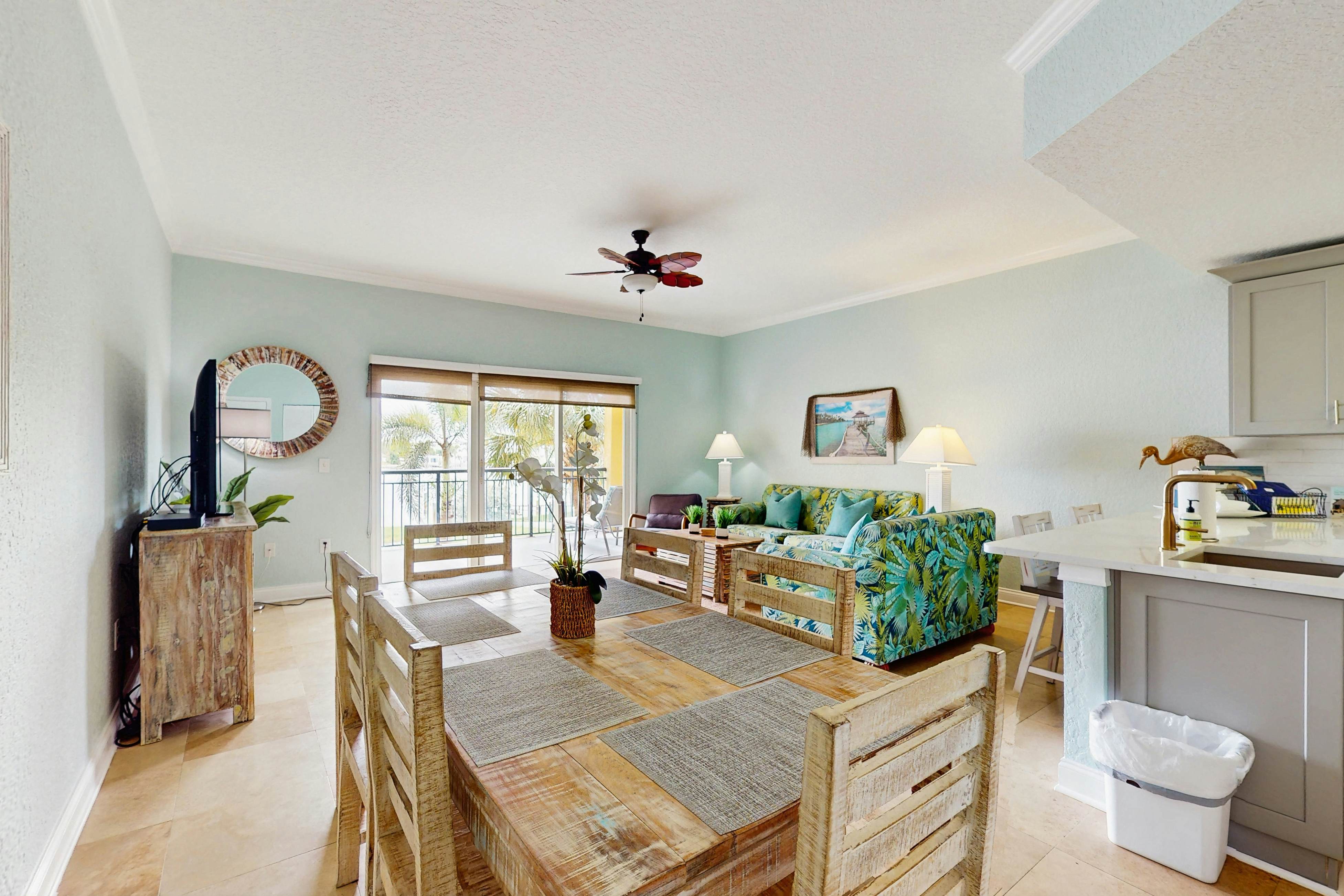 Water-view condo with pool, hot tub, pier, private balcony, AC, & washer/dryer