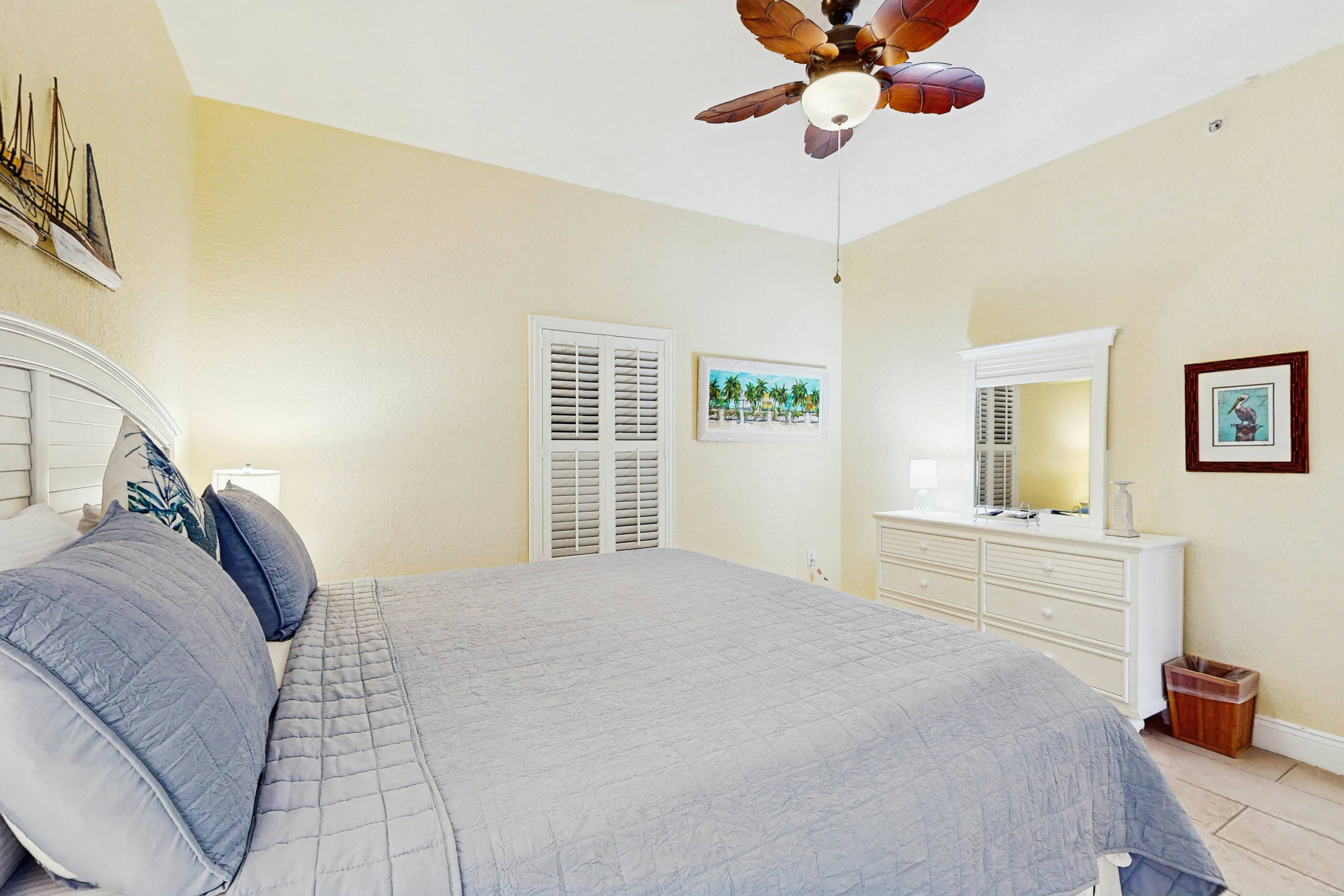 Water-view condo with pool, hot tub, pier, private balcony, AC, & washer/dryer