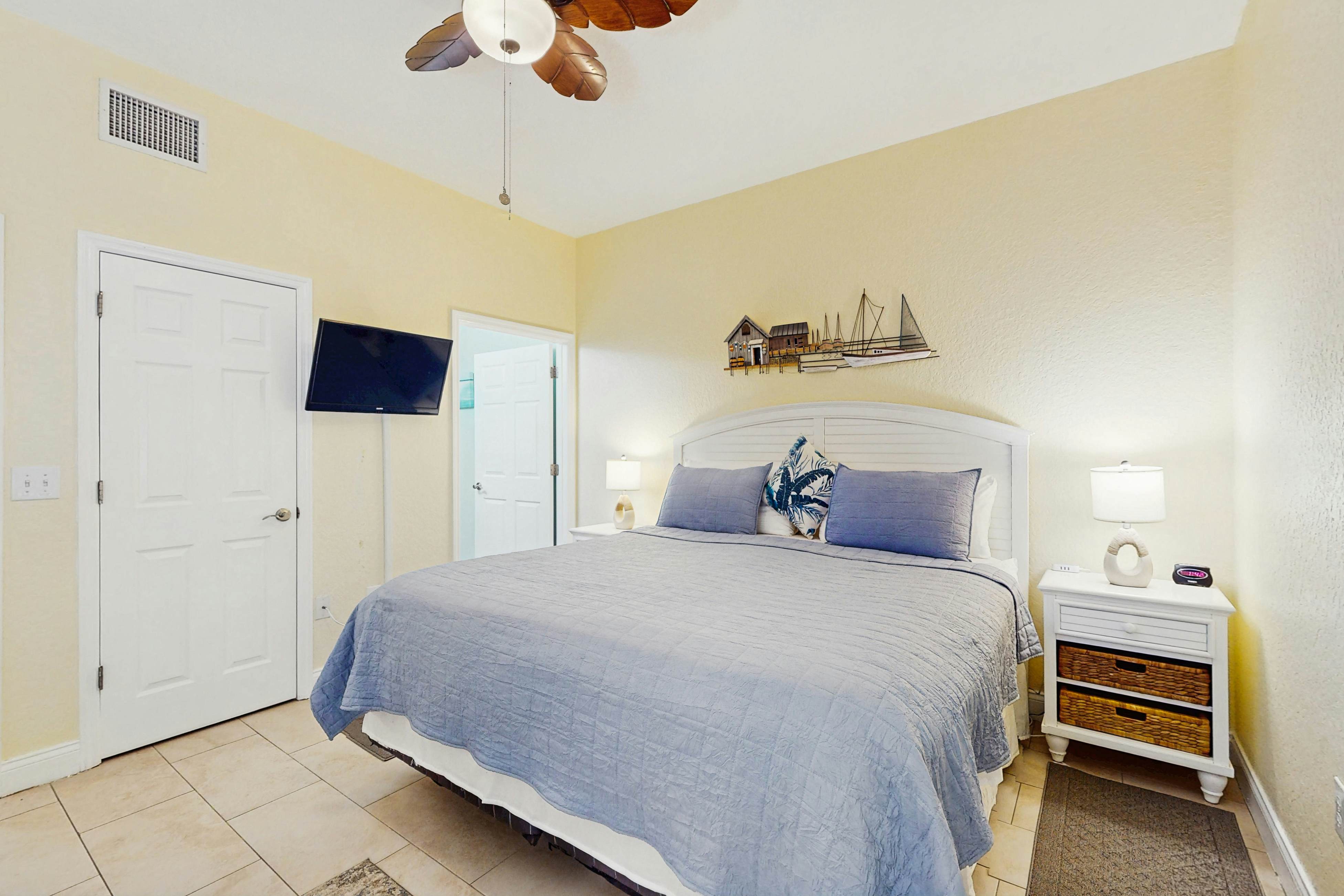 Water-view condo with pool, hot tub, pier, private balcony, AC, & washer/dryer