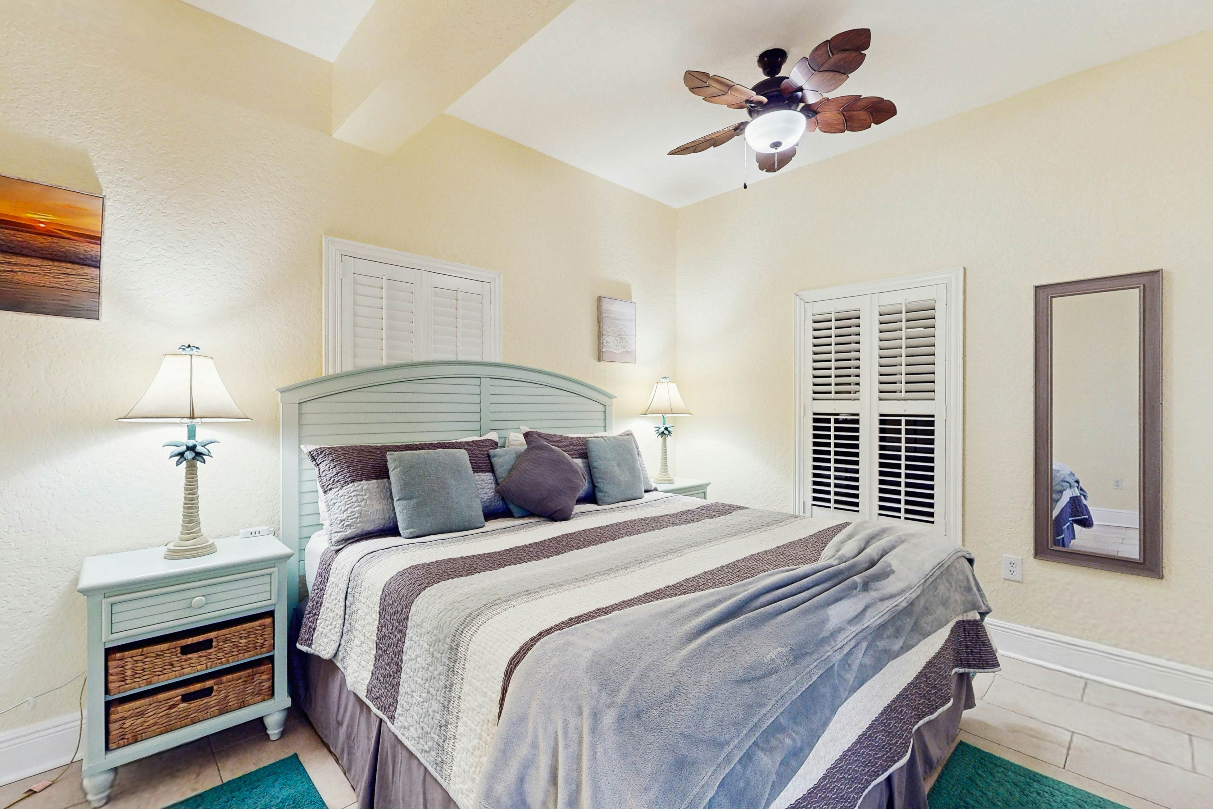 Water-view condo with pool, hot tub, pier, private balcony, AC, & washer/dryer