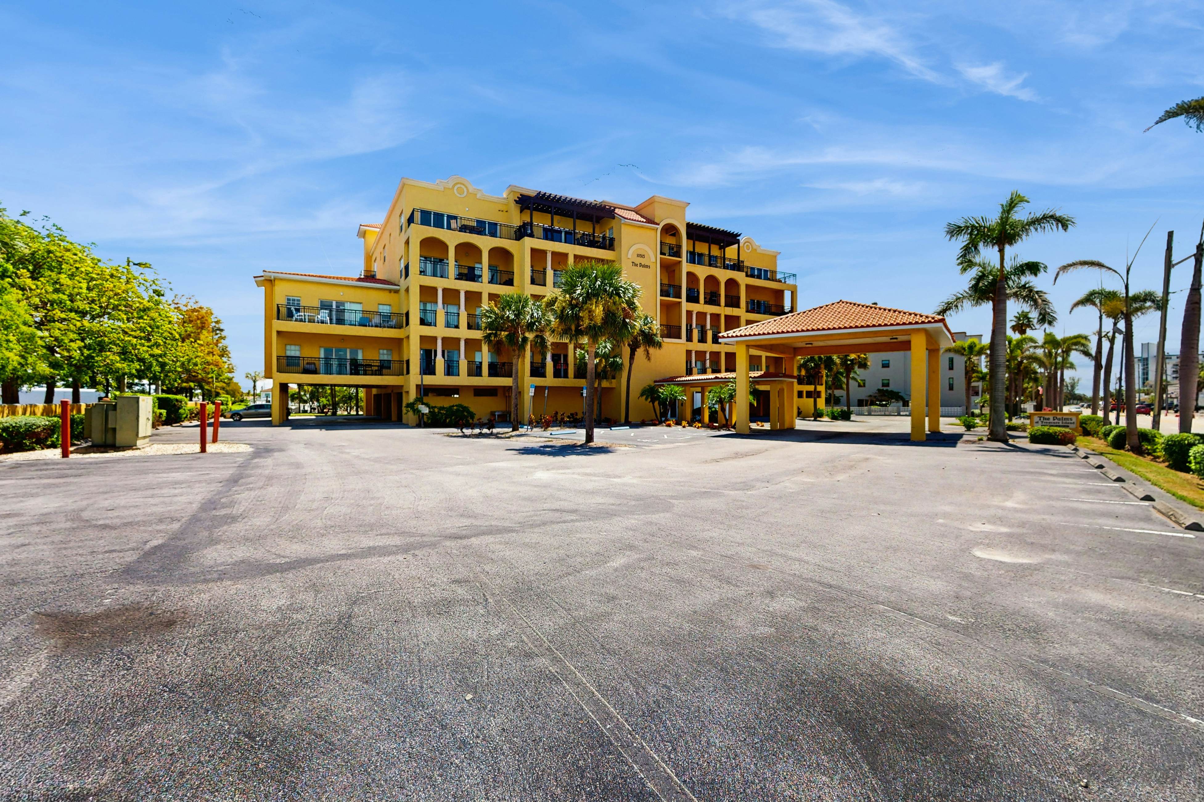 Water-view condo with pool, hot tub, pier, private balcony, AC, & washer/dryer