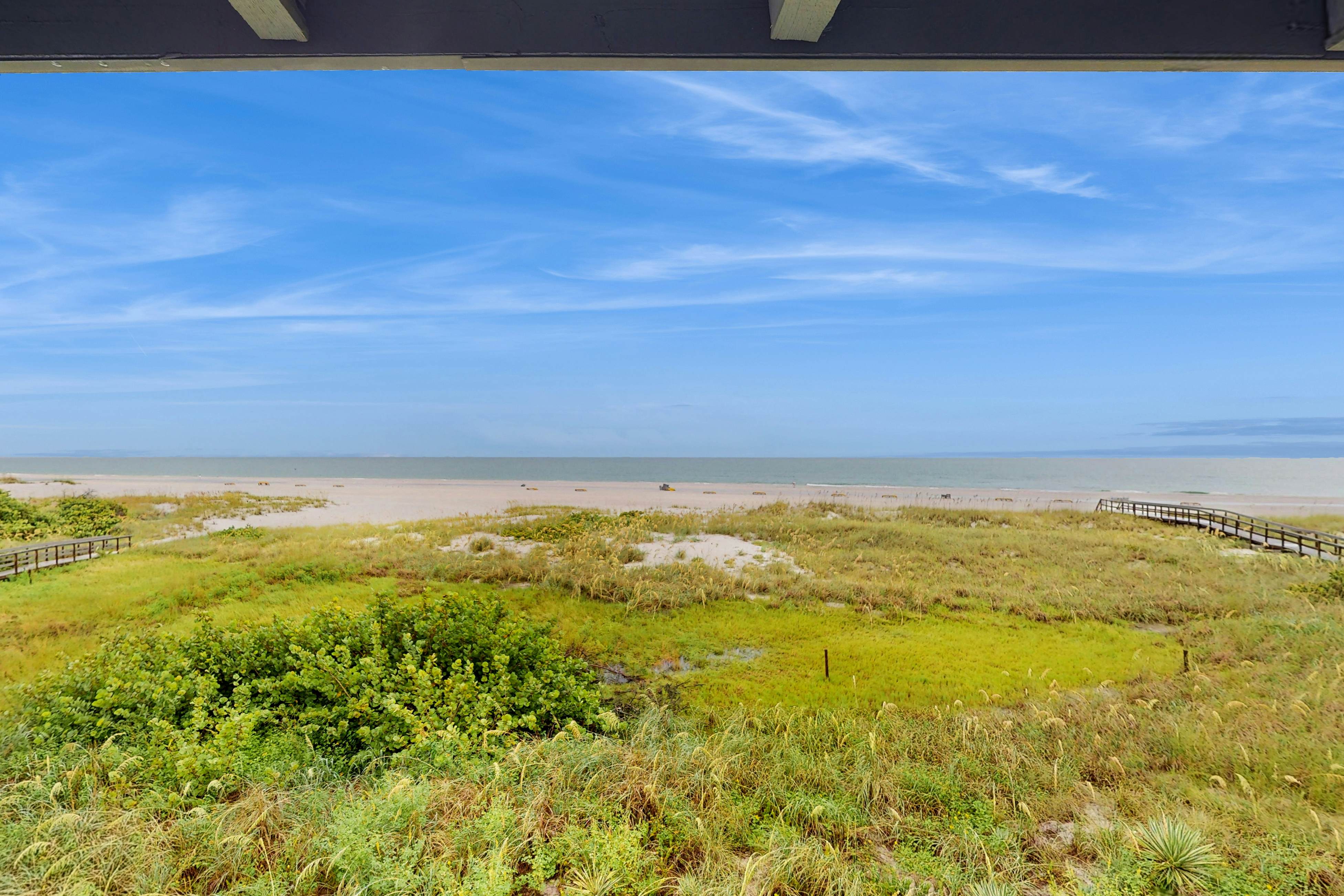 3rd-floor beachfront condo with beach access, pool, Gulf views, W/D, balcony, AC